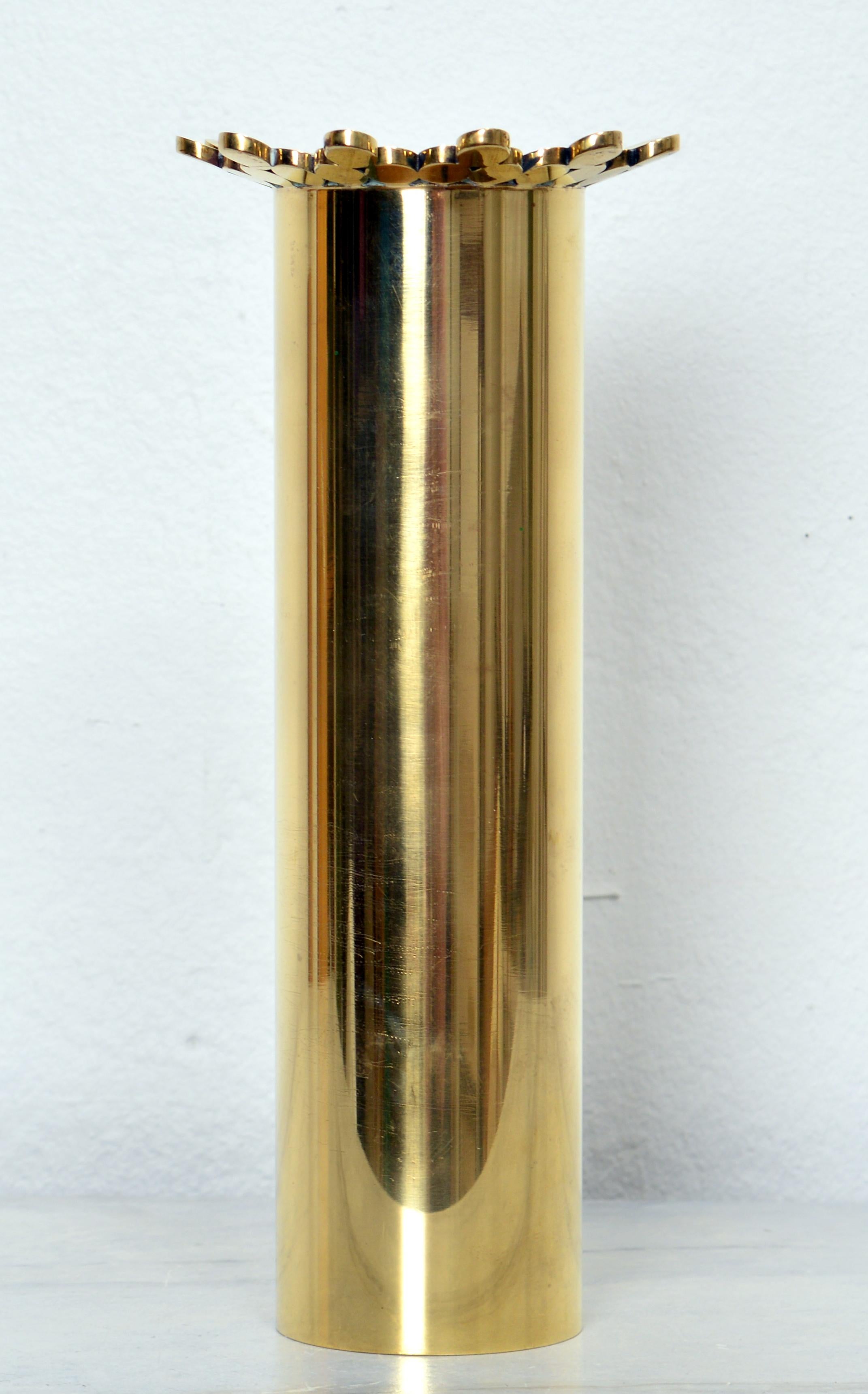 This vase was hand crafted at the Skultuna studio were Pierre Forssell was working with he's assistant. The vase is made of a brass tube where a brass curved crown was delicately welded to the base. Simple, minimal and elegant at the same time. The