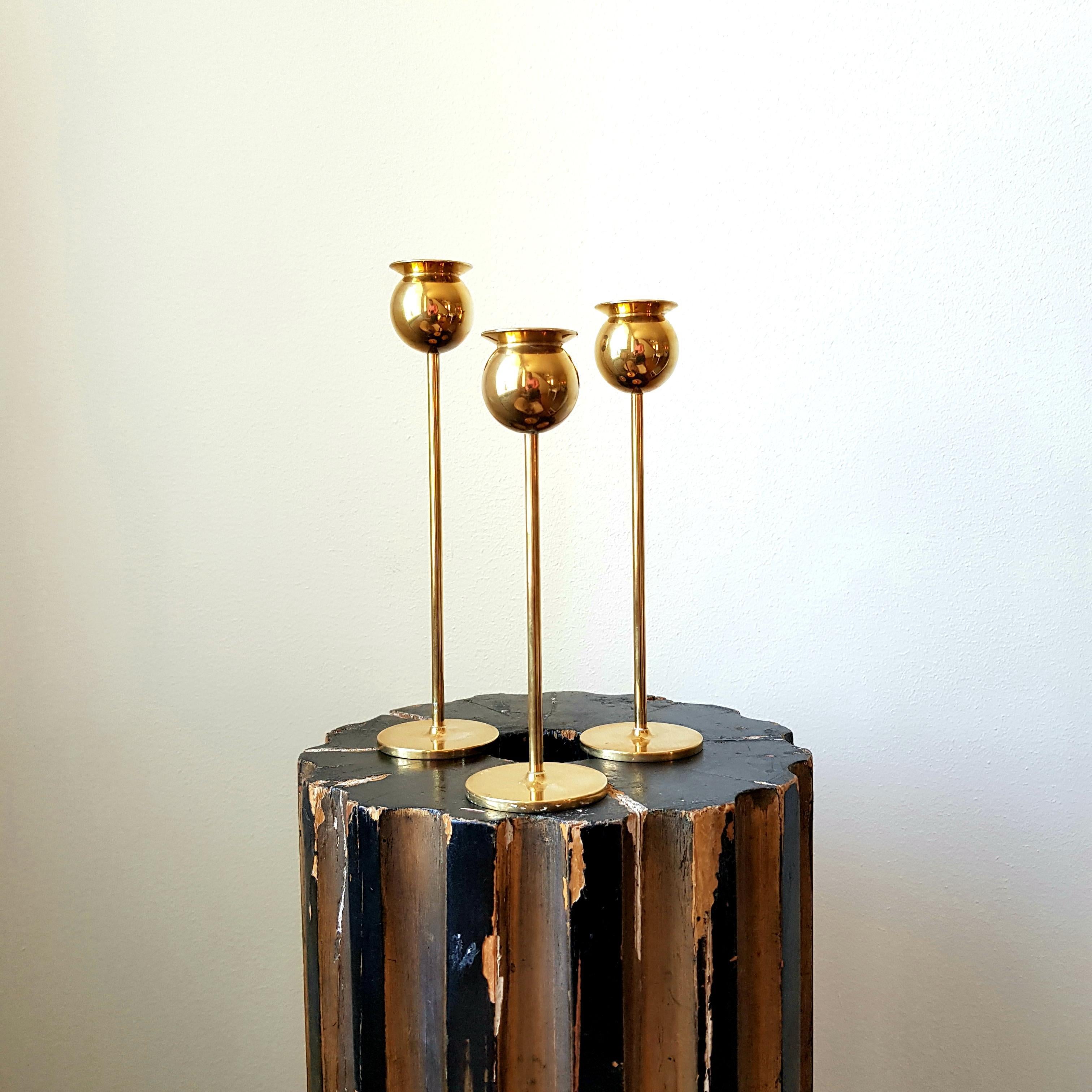A set of three “Tulip” candlesticks by Pierre Forsell for Skultuna Bruk, Sweden.  The set was manufactured during Forsell’s tenure at Skultuna. Each piece is stamped at the base along with the “F”, which shows that the piece was made during his time