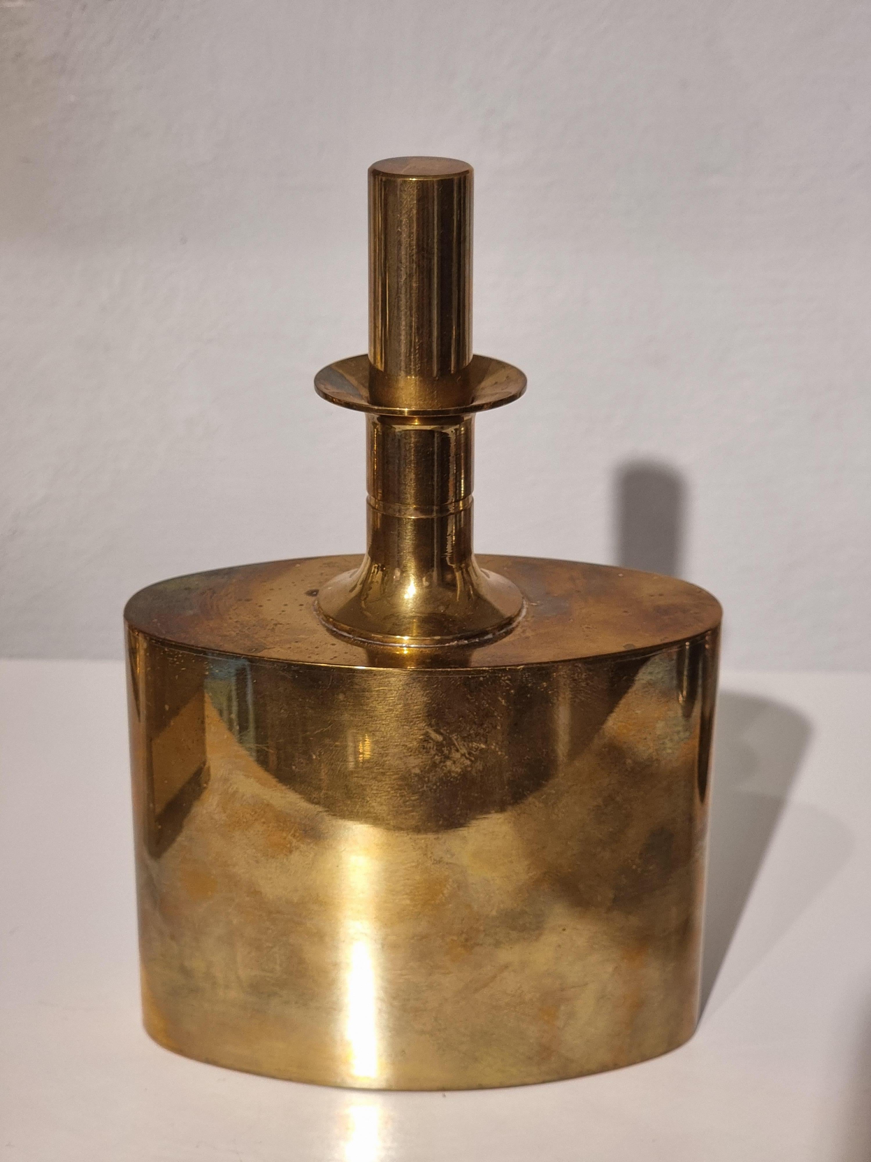 Gilded brass flask with stopper by Pierre Forssell for Skultuna Bruk, Sweden mid-1900s. 

Skultuna Bruk was founded in 1607. This flask has its hallmarks and is one of the companies most iconic works by Pierre Forssell. 
