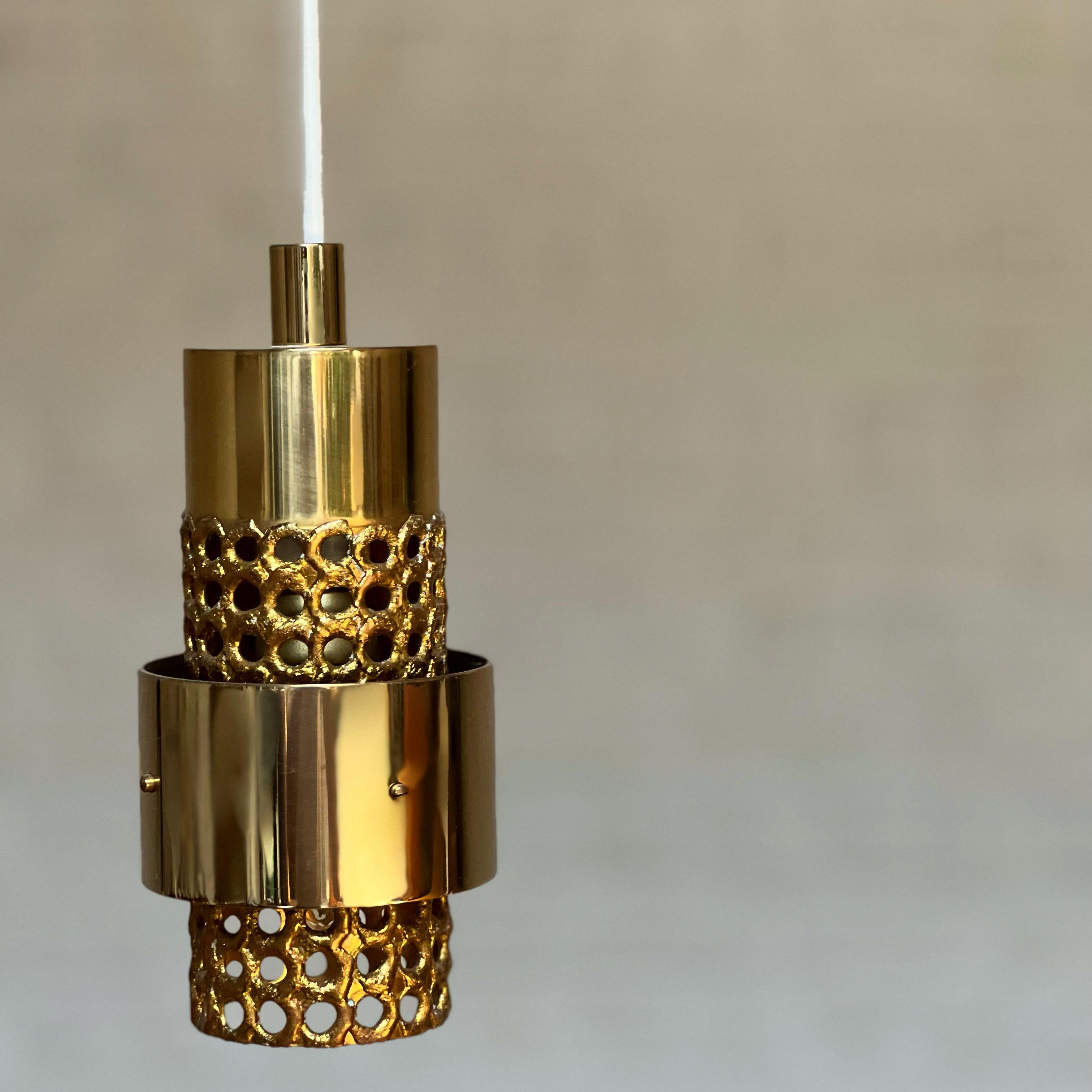 This is a unique and very exclusive set of 7 lamps hand crafted in 70's at the Skultuna studio were Pierre Forssell was working with he's assistant. Each lamp is made of a brass tube where some holes were drilled with the torch by these skilled