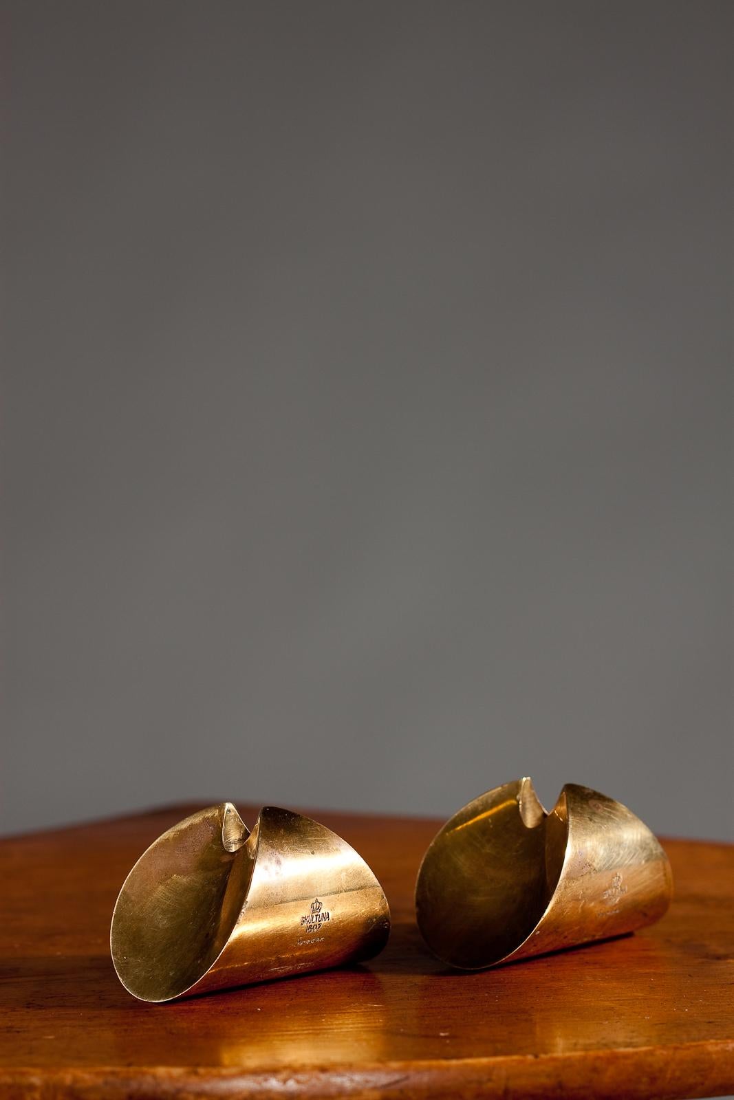 Pierre Forssell, pair of rare 1950's rocking tulip brass candlesticks, Skultuna For Sale 1