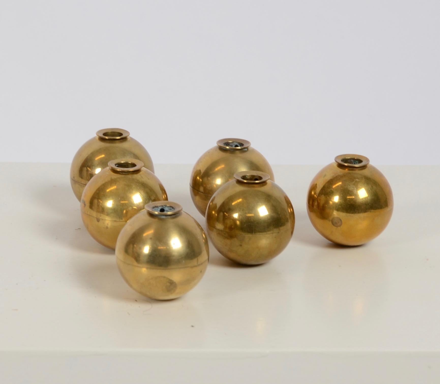 A set with six candleholders in brass, designed by Pierre Forssell for Skultuna Bruk, 1960s.