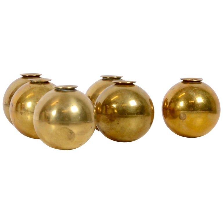 Pierre Forssell set of six brass candleholders, 1960s, offered by Skultuna Bruk