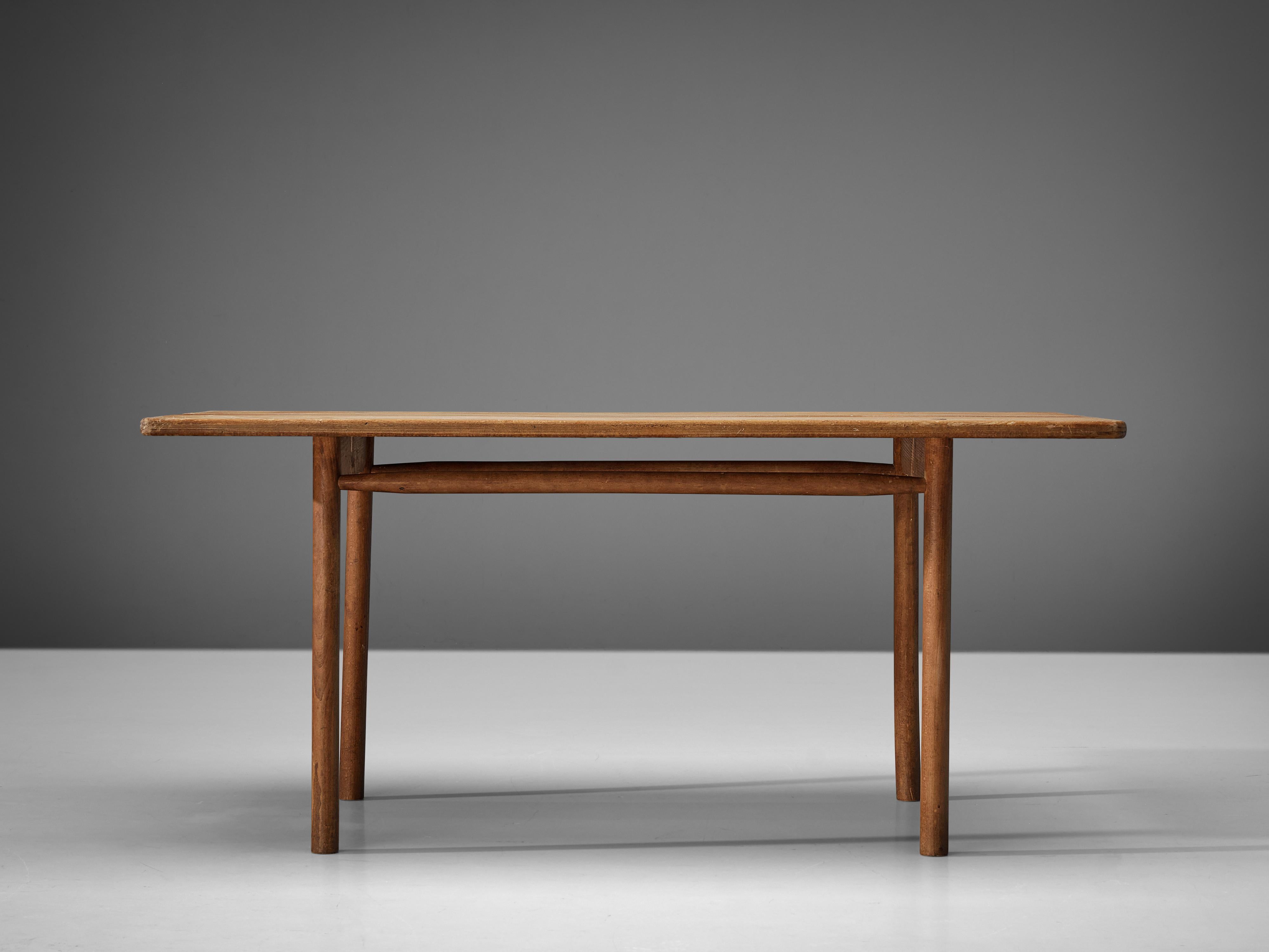 Pierre Gautier-Delaye, table, solid beech, France, 1950s

Simplistic table by French designer Pierre Gautier-Delaye. The sleek design shows a beautiful line, which is emphasized by the open space in the middle of the table. Moreover, the quality of