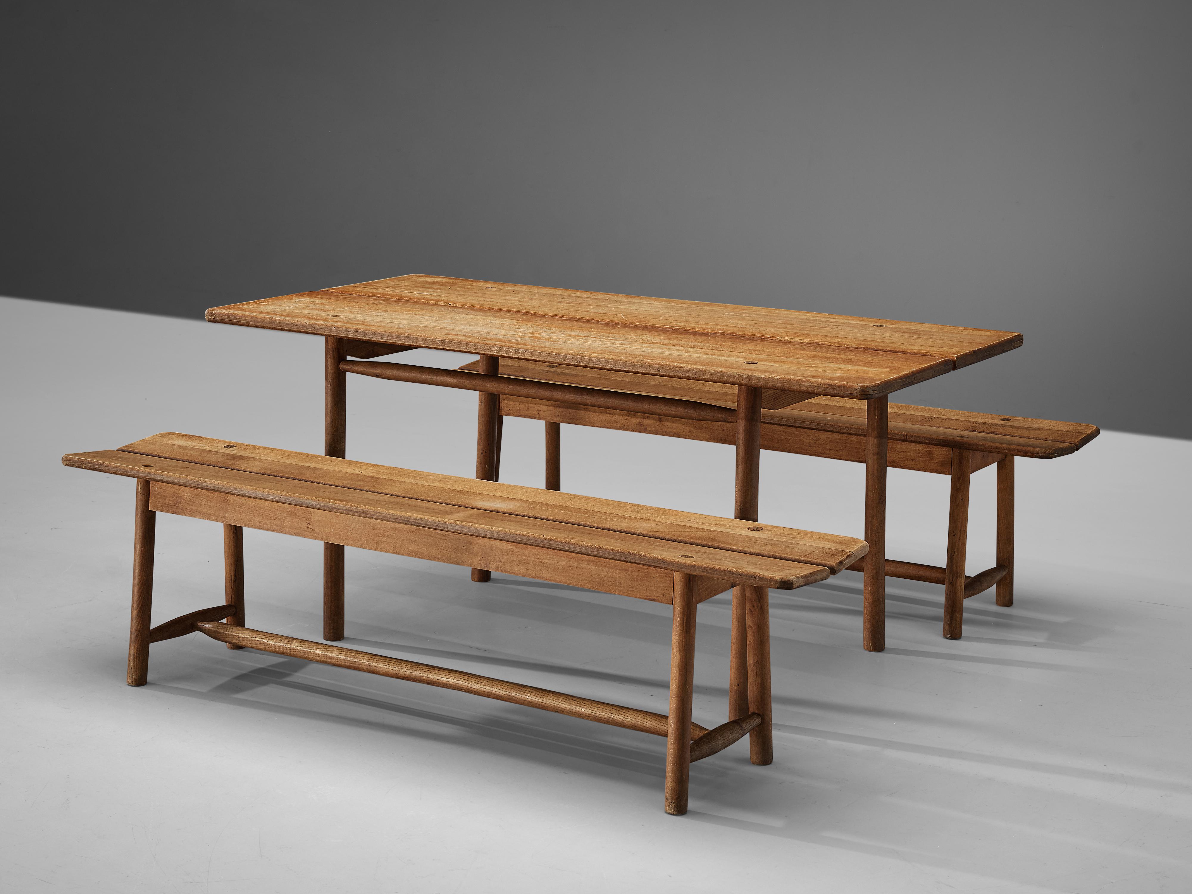 Pierre Gautier-Delaye, table, solid beech, France, 1950s

Simplistic table and benches by French designer Pierre Gautier-Delaye. The sleek design shows a beautiful line, which is emphasized by the open space in the middle of the table and bench.