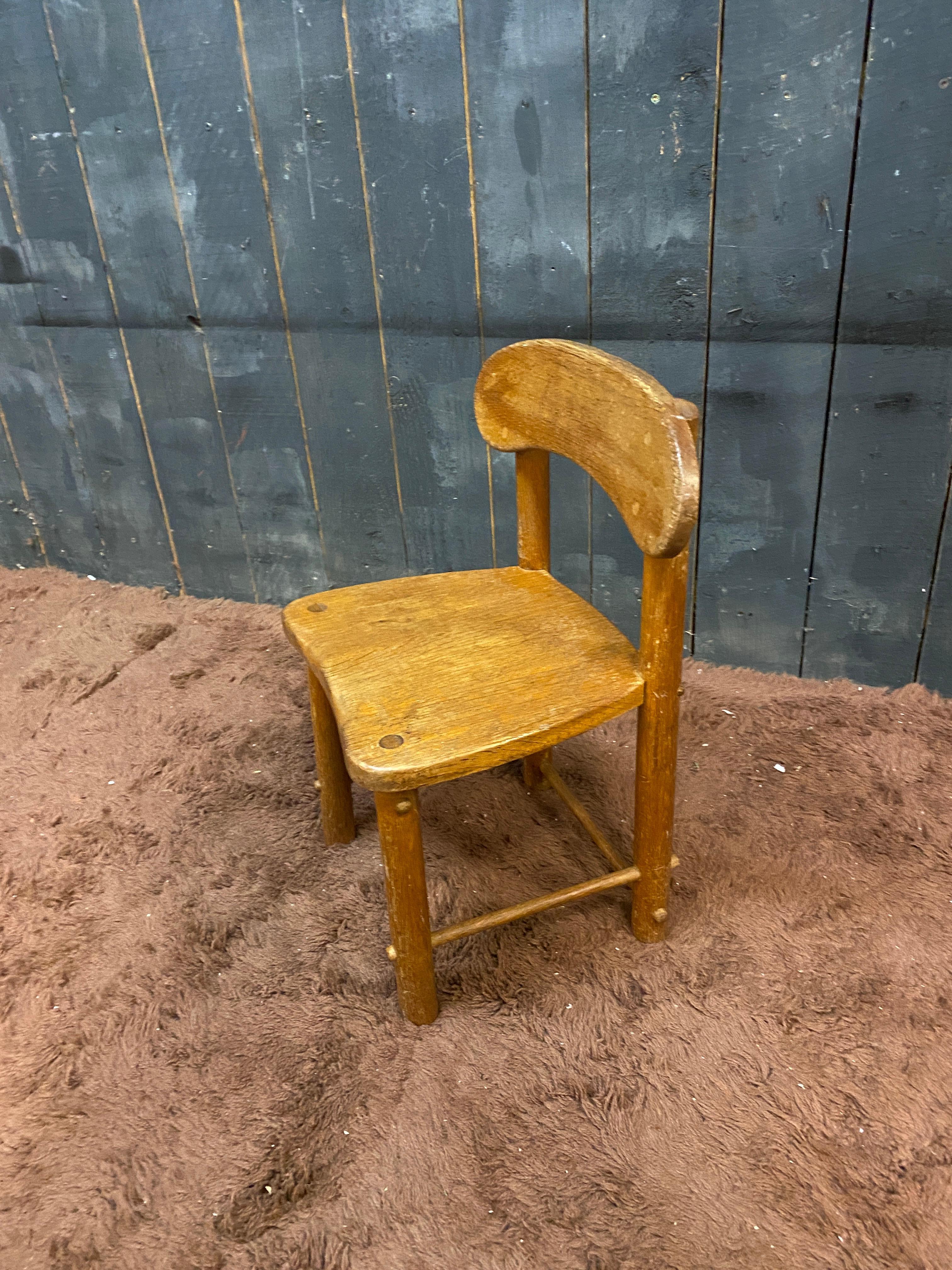 Oak Pierre GAUTIER DELAYE (in the style of), small child's chair circa 1950/1960 For Sale