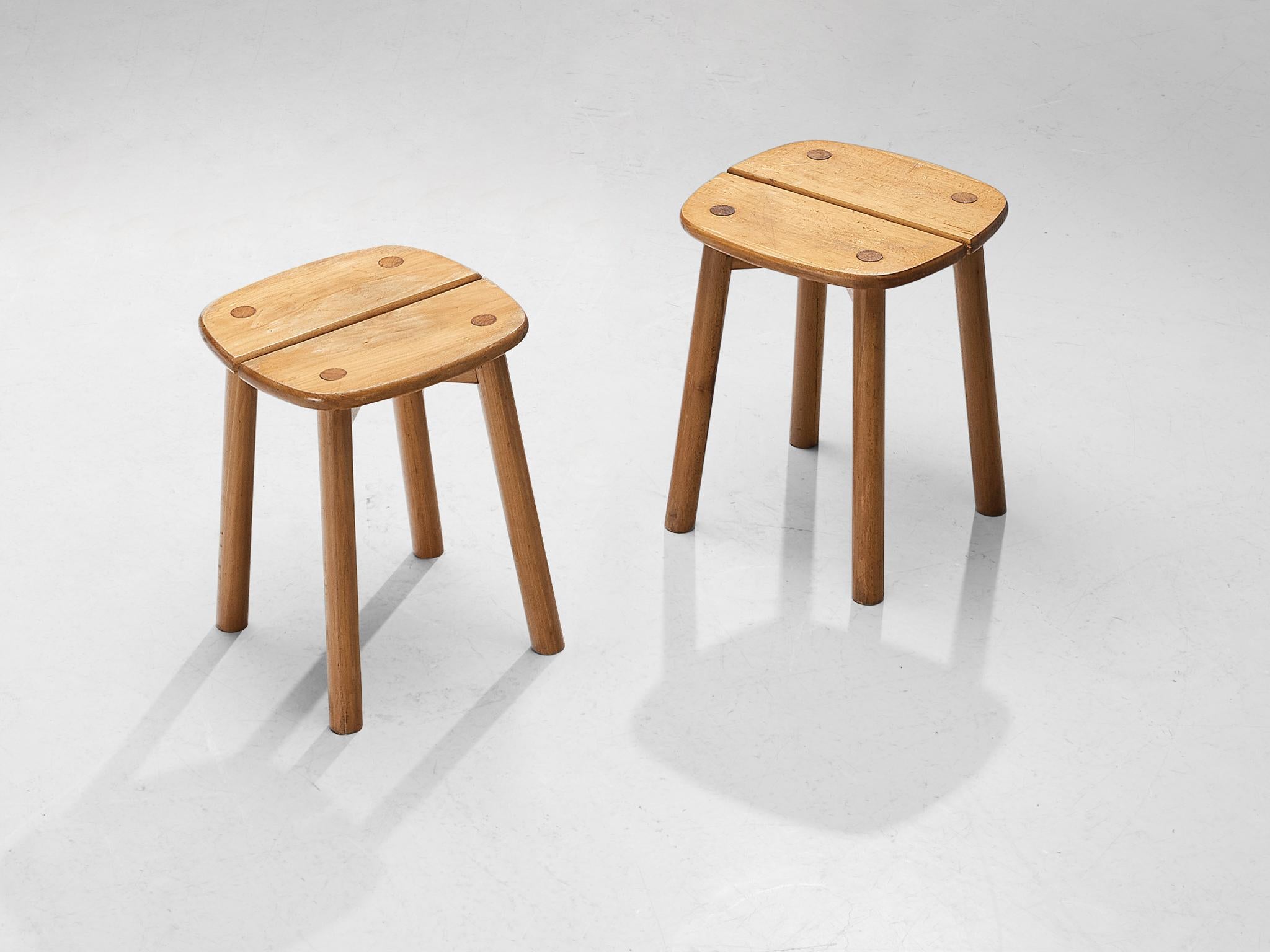 Pierre Gautier-Delaye, pair of stools, beech, France, 1960s

This subtle and modest stool is executed in stained beechwood. The seating area is divided into two organically shaped slats and is detailed with wood-joints of the four cylindrical legs.