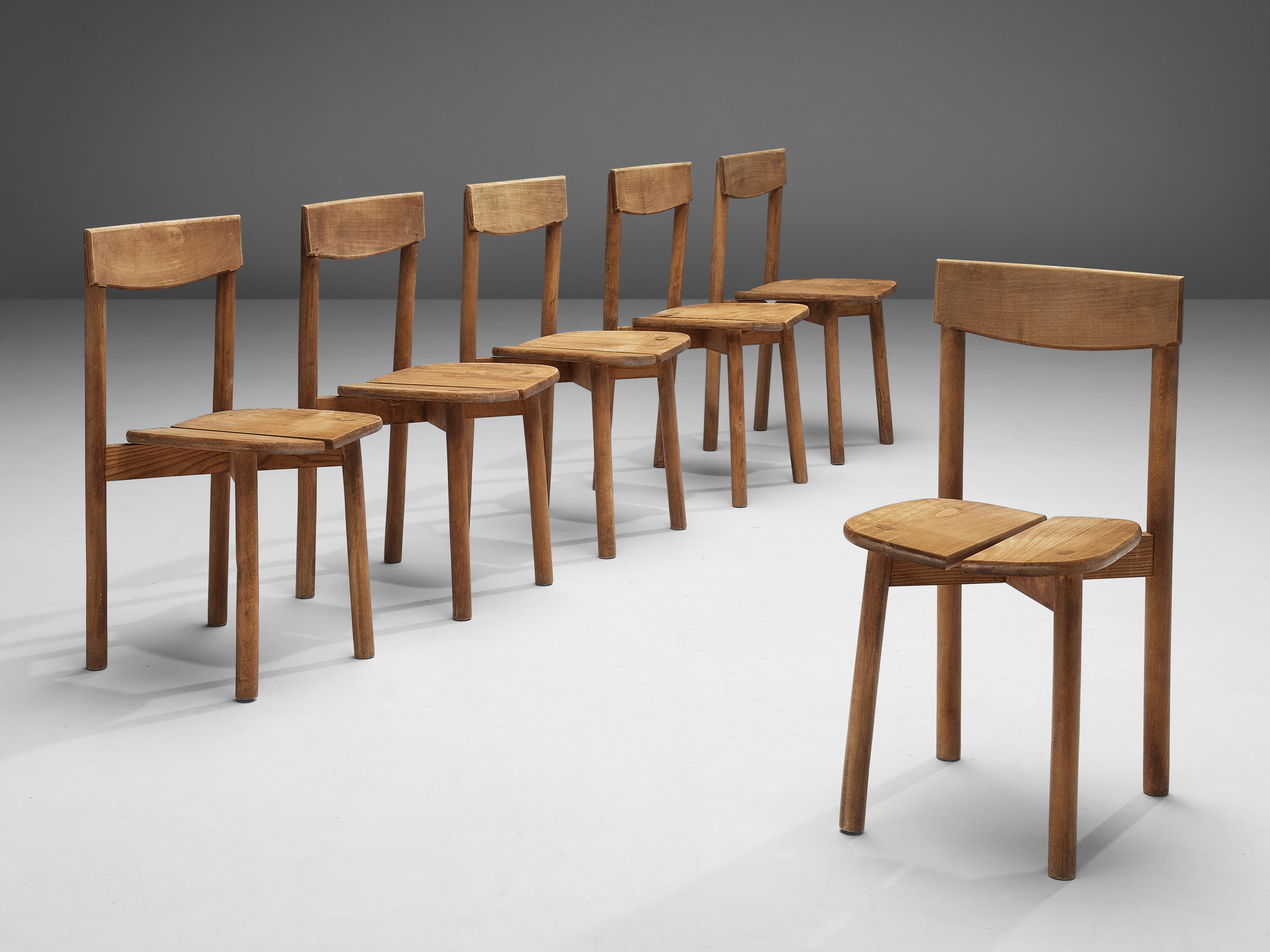 Pierre Gautier-Delaye, set of six dining chairs, beech, France, 1960s

This set of subtle and modest dining chairs are executed in stained beechwood. The seating area is divided into two organically shaped slats and is detailed with wood-joints of