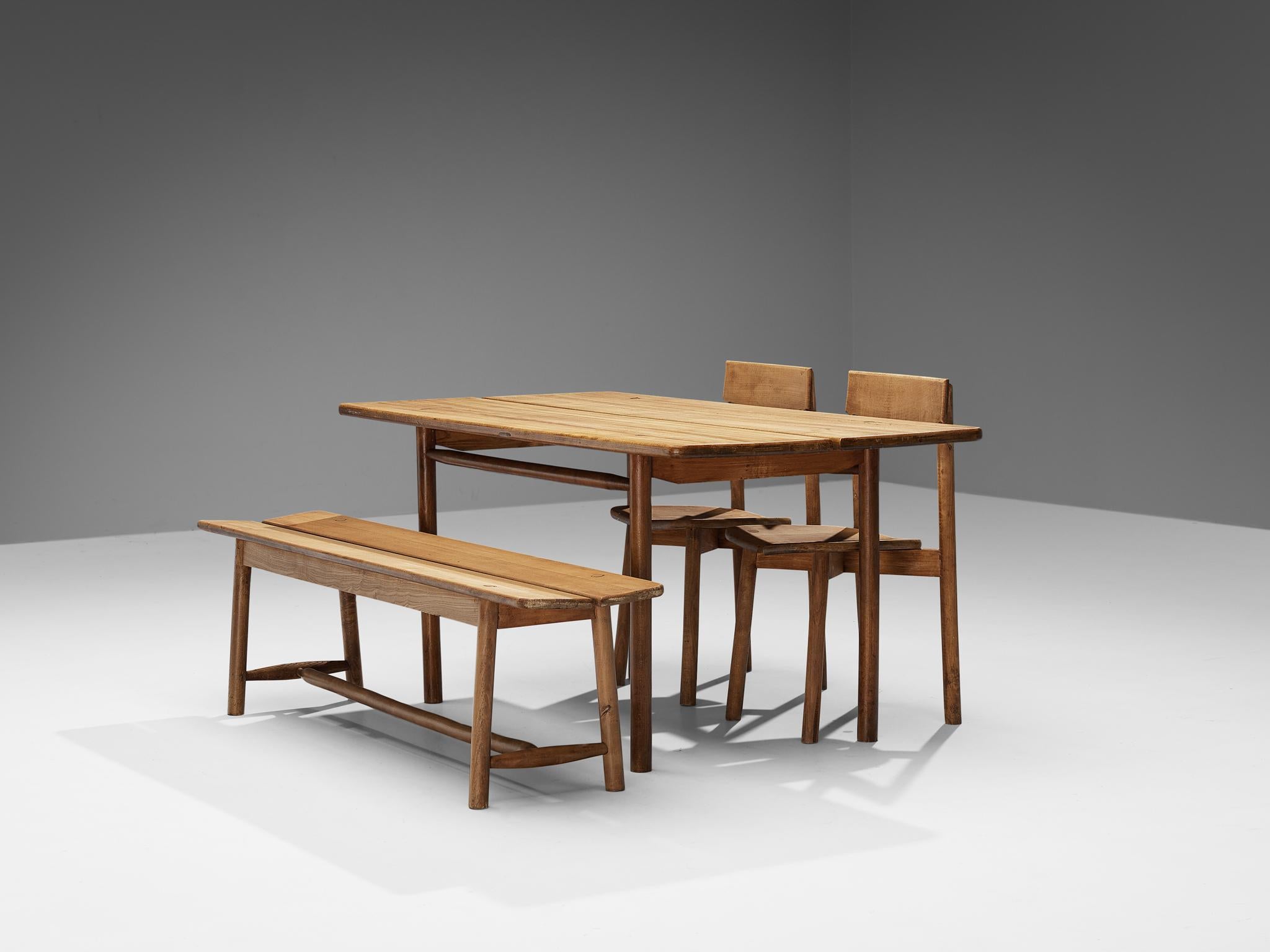 Pierre Gautier-Delaye, set of table with bench and chairs, solid beech, France, 1950s

Simplistic table with bench and chairs by French designer Pierre Gautier-Delaye. The sleek design shows beautiful lines, which are clearly emphasized by the open