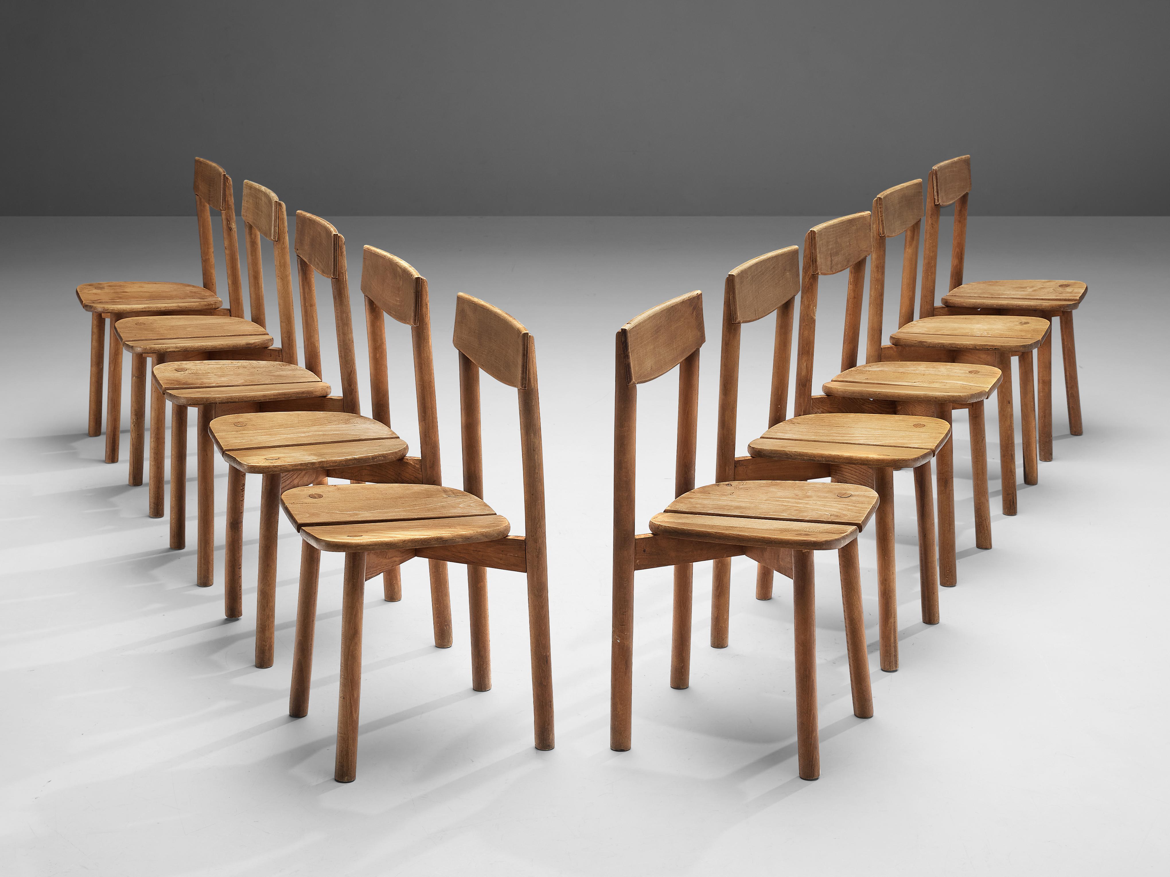 Pierre Gautier-Delaye, set of ten dining chairs, beech, France, 1960s

This set of subtle and modest dining chairs are executed in stained beechwood. The seating area is divided into two organically shaped slats and is detailed with wood-joints on
