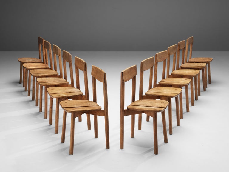 Mid-20th Century Pierre Gautier-Delaye Set of Twelve Dining Chairs For Sale