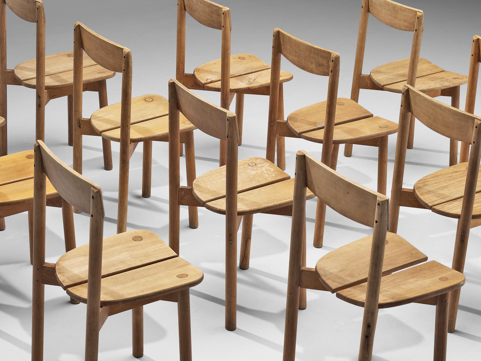 Milieu du XXe siècle Pierre Gautier-Delaye Ensemble de douze chaises de salle à manger en vente
