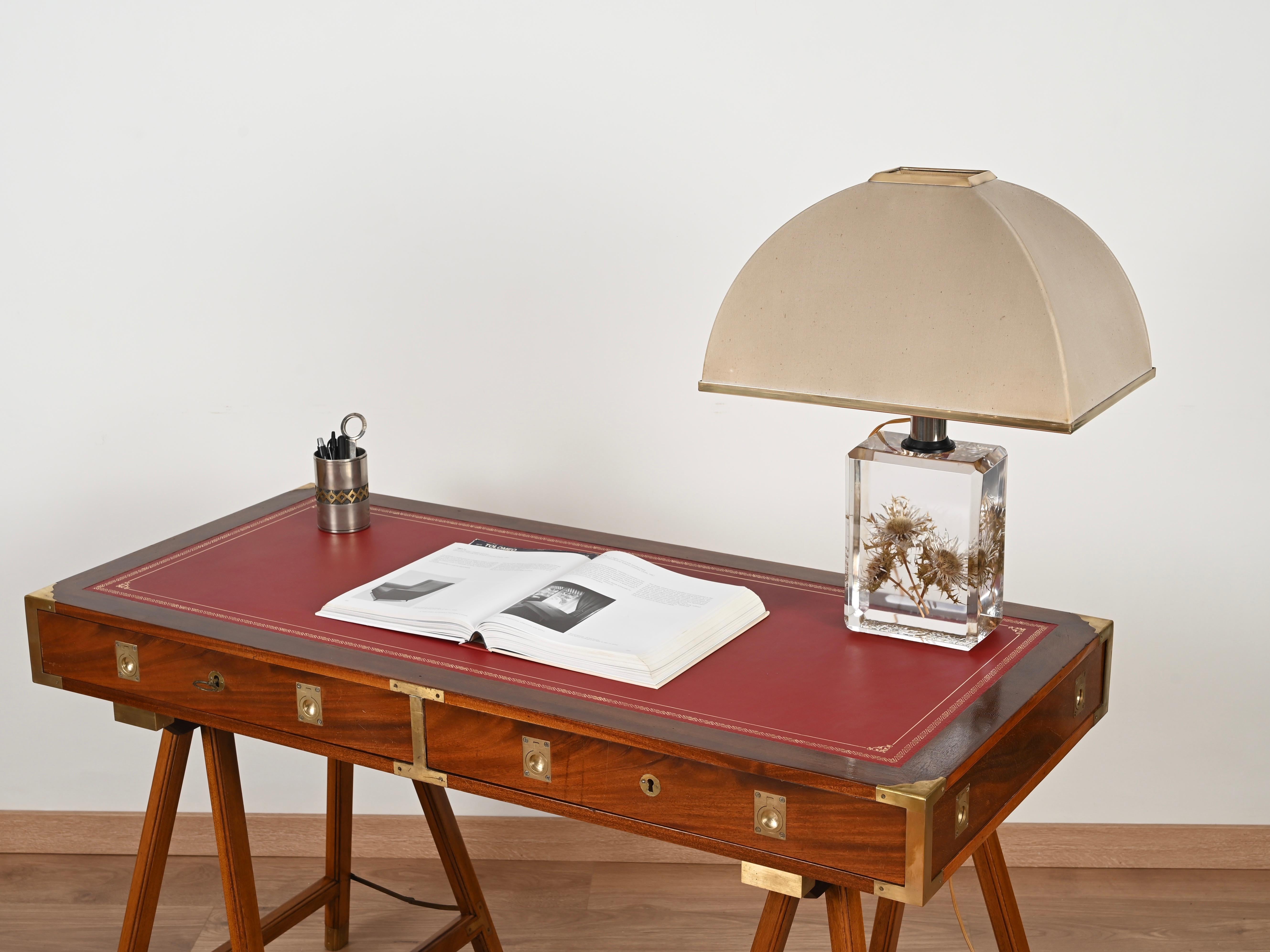 Spectacular large Mid-Century table lamp designed by Pierre Giraudon in France during the 1970s. 

This unique table lamp is fully made in clear beveled lucite enriched inside with three thistle flowers and a base with a beautiful ice effect. The