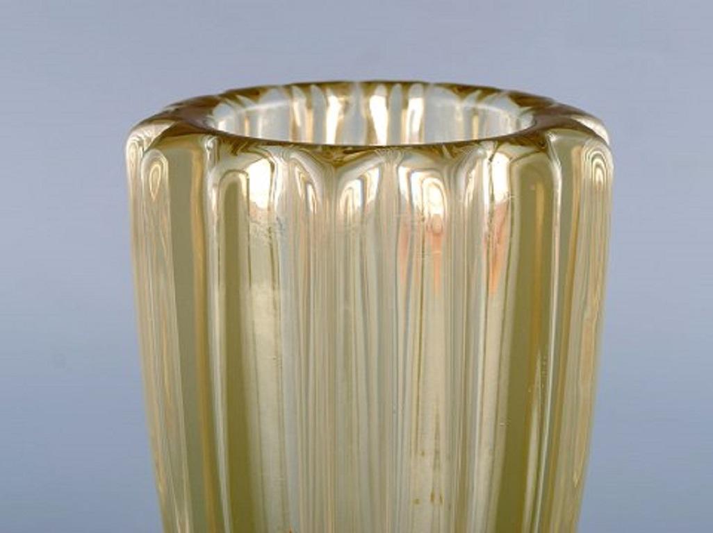 Pierre Gire (1901-1984), aka Pierre D'Avesn. Art Deco vase in yellow art glass. 1940s.
Measures: 18 x 13.5 cm.
In very good condition.
Pierre Gire (1901-1984), aka Pierre D'Avesn.
In the beginning, at 14 years old, he worked at Rene Lalique's