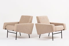 Pierre Guariche (1926-1995), pair of G10 armchairs, Airborne ed., 1955