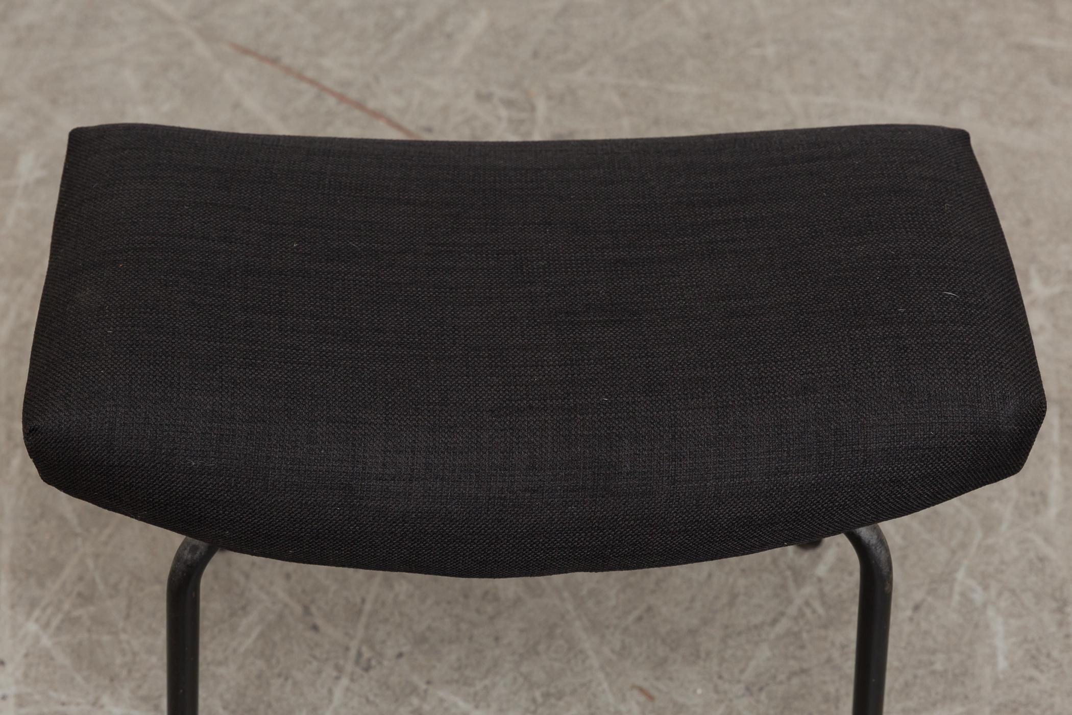 Pierre Guariche Attributed Black Upholstered Foot Stool with Black Tubular Legs In Good Condition For Sale In Los Angeles, CA