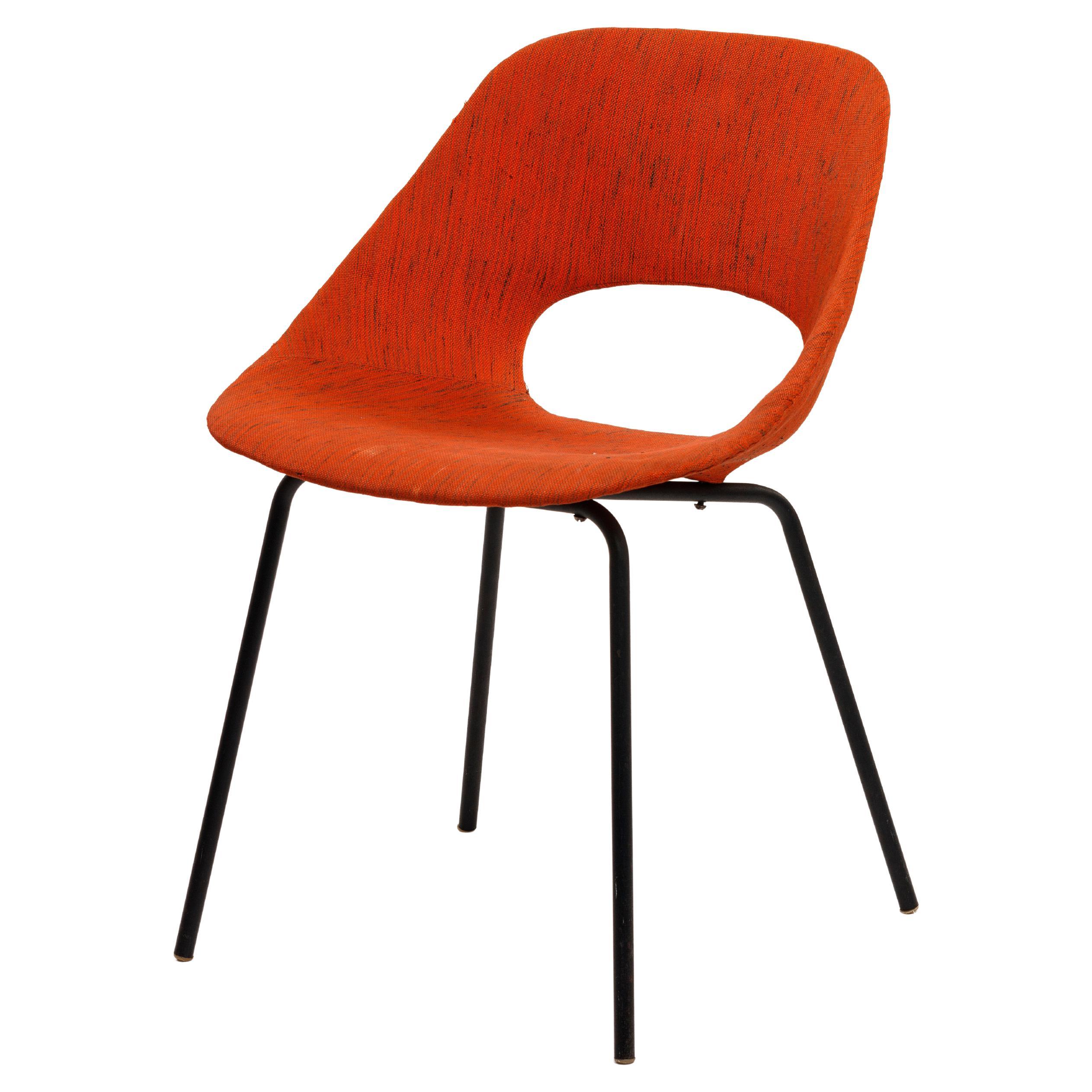 Stunning cast aluminum chair with their original orange fabric, extremely rare chair with their original fabric. 

In 1951 Guariche began to collaborate with Steiner, another major furniture manufacturer. He designed the innovative chair called