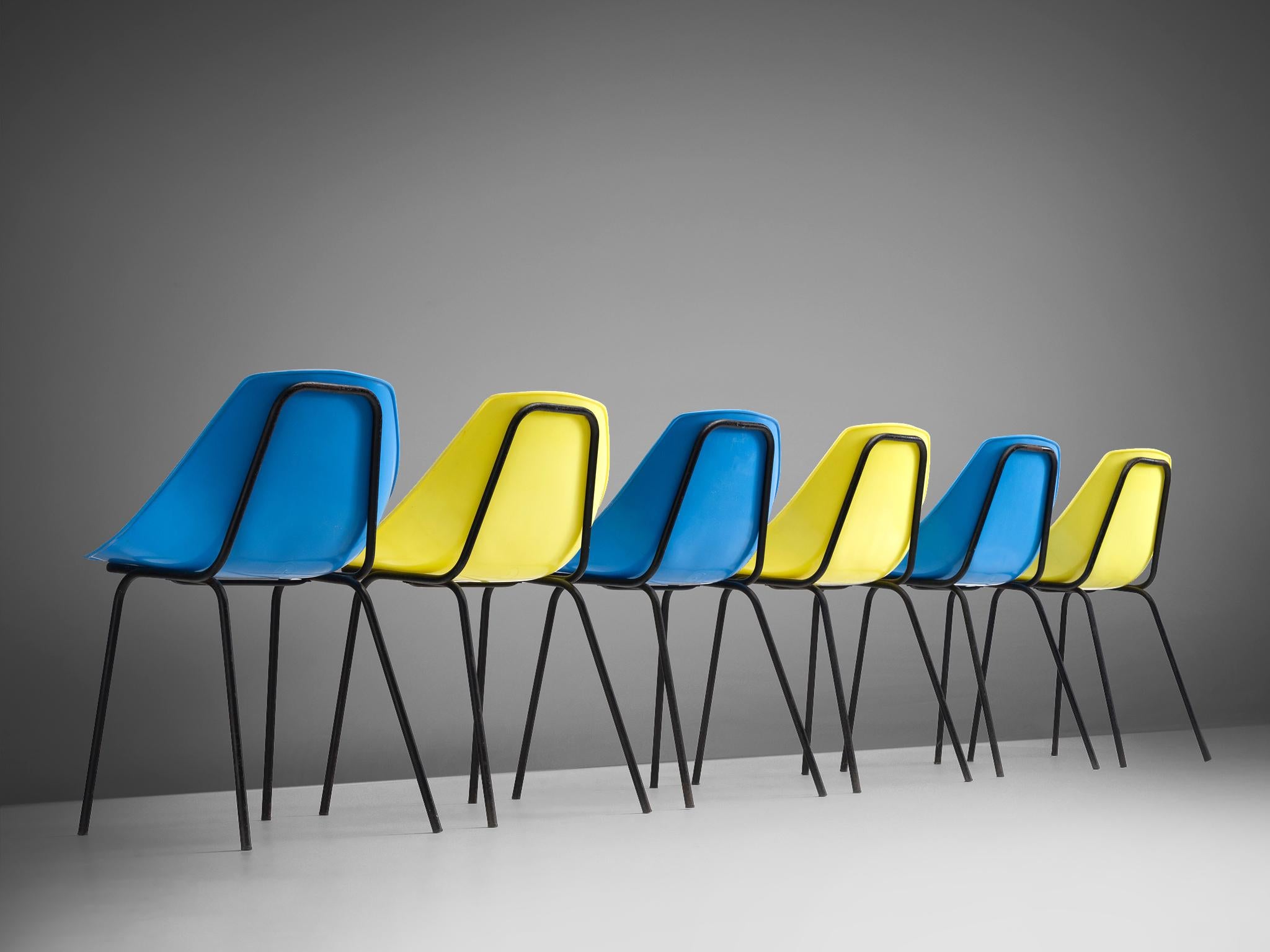 Pierre Guariche for Meurop, set of six chairs in yellow and blue plastic, model 'Coquillage', Belgium, 1960s.

These chairs were designer by Pierre Guariche for Meurop and titled 'Coquillage'. The playful lines of the seat shell work well with the