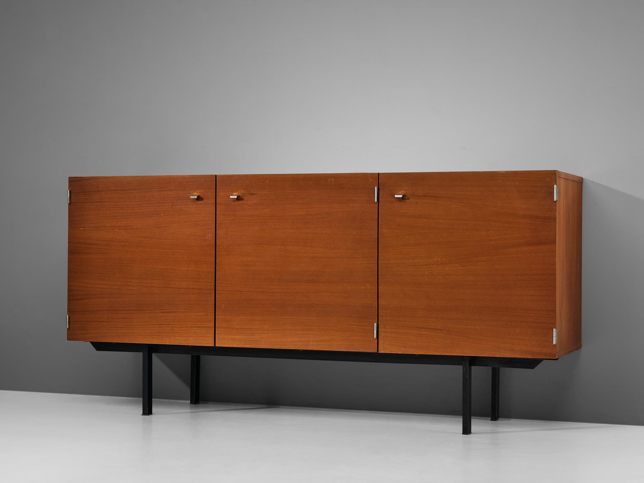 Pierre Guariche for Meurop, sideboard, mahogany, metal, Belgium, 1970s

French designer Pierre Guariche created this sideboard for the Belgian manufacturer, Meurop. The sideboard, a testament to Guariche's keen design sensibilities, features three