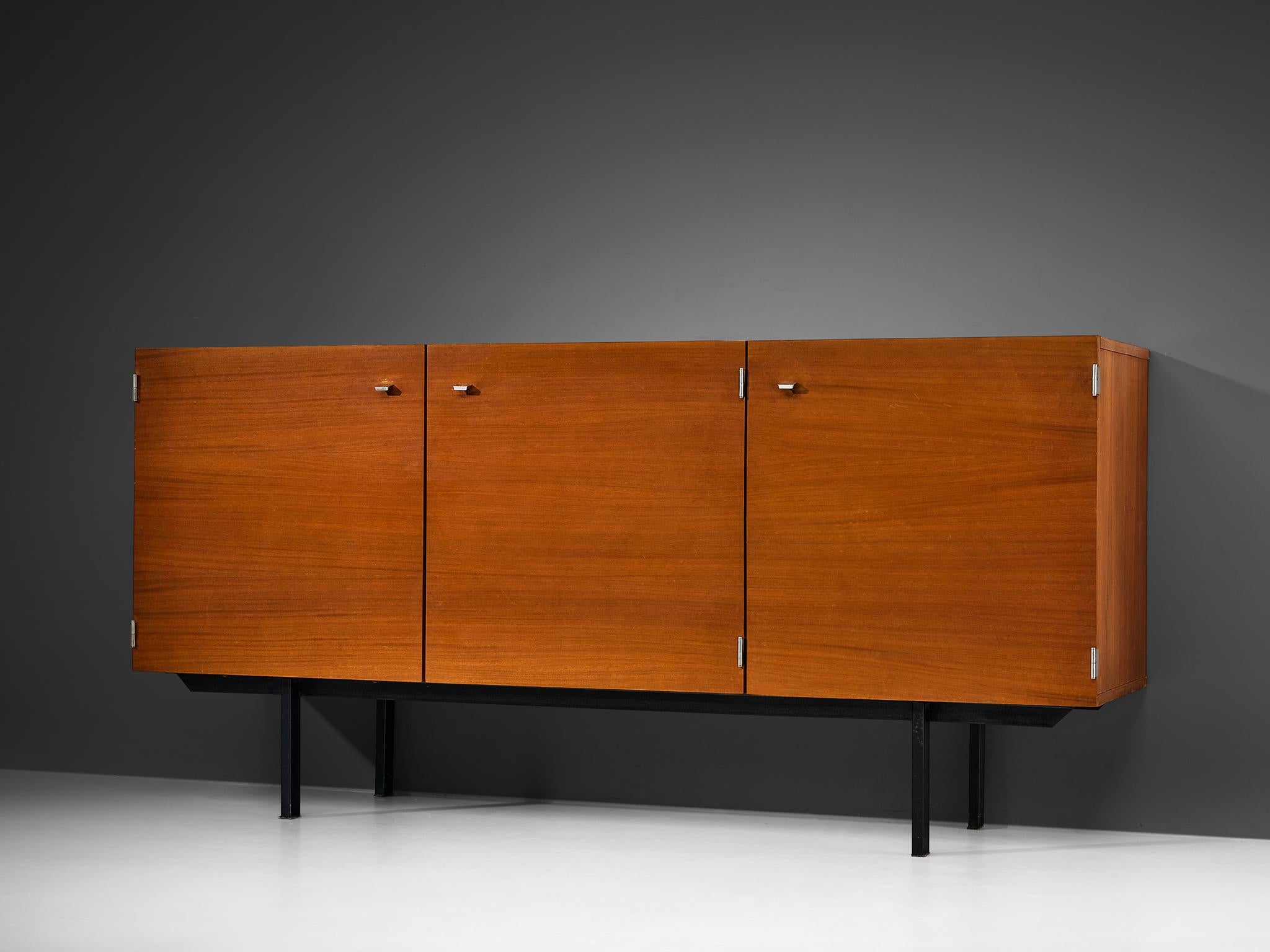 Pierre Guariche for Meurop, sideboard, mahogany, metal, Belgium, 1970s

French designer Pierre Guariche created this sideboard for the Belgian manufacturer, Meurop. The sideboard, a testament to Guariche's keen design sensibilities, features three