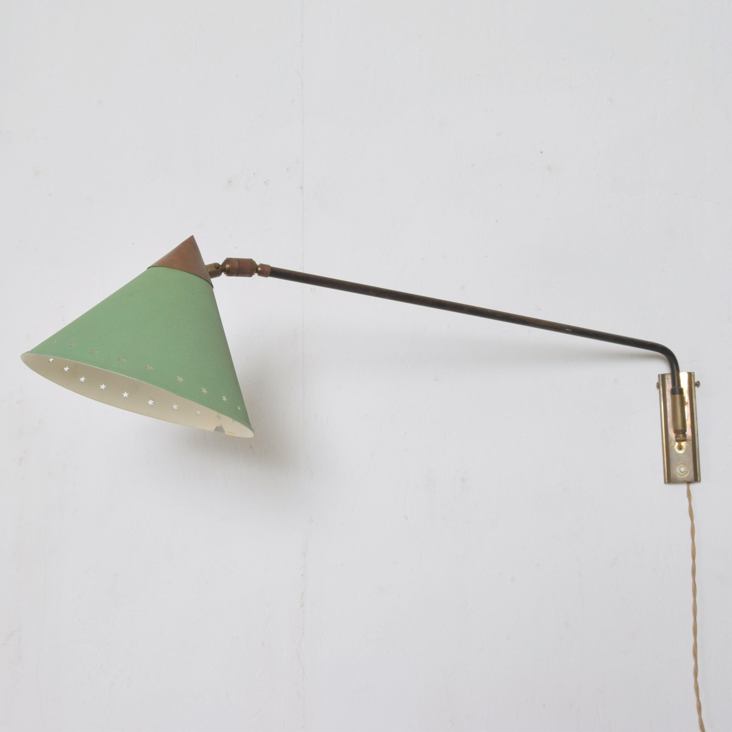 Pierre Guariche Pistachio green cone wall lamp perfect patina modern sexy wall sconce, France, 1950s
No maker stamp apparent. Attributed to the style of Pierre Guariche.
Measures: Height 8.5 in.
Width 30 in
Depth 13.25 in
Lamp attaches to the