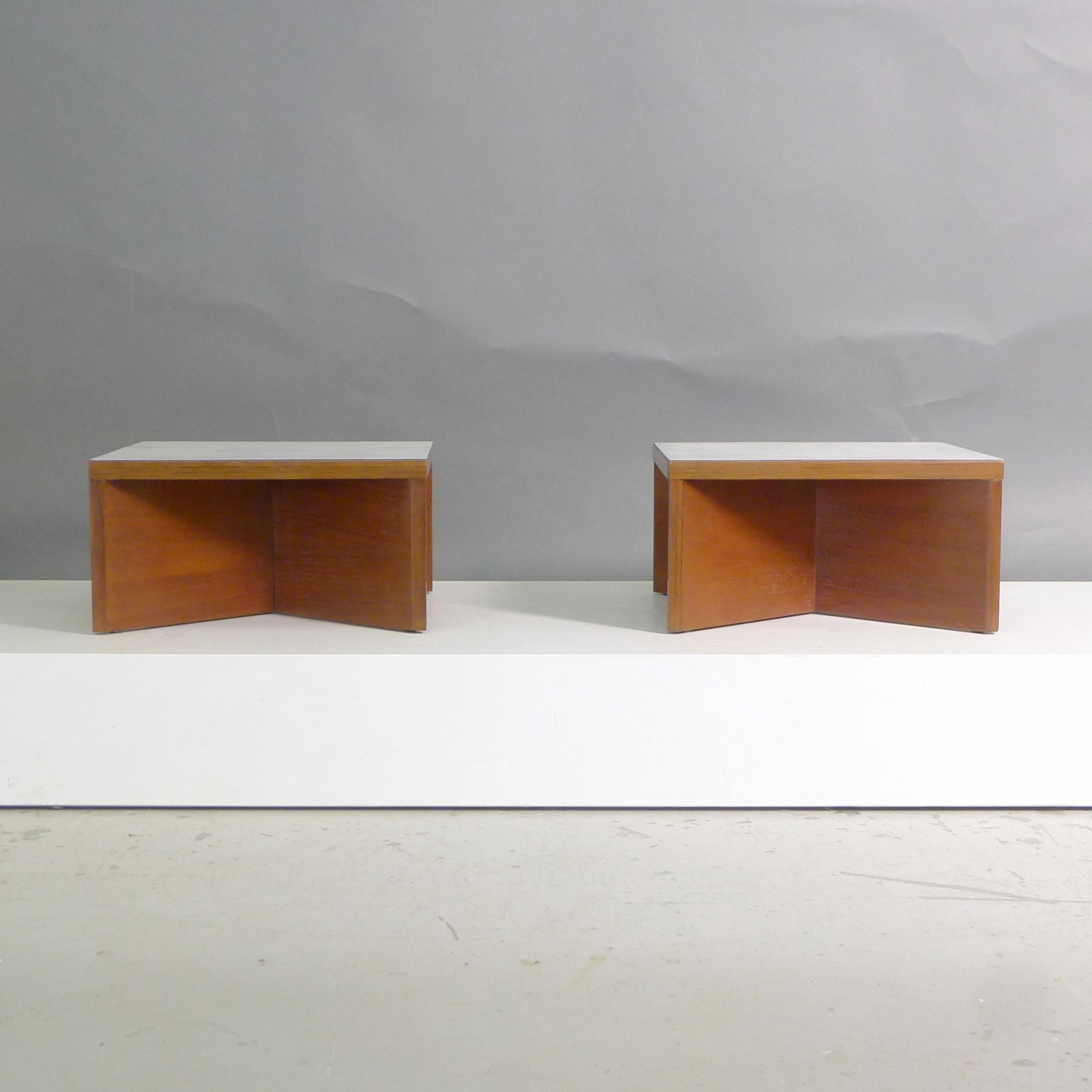Pierre Guariche (1926-1995)
Set of two square coffee or side tables from the Aquilon series
manufactured by Les Huchers-Minvielle, circa 1960
each formed from a cross base in teak with white laminate top,
metal button to bottom of each foot
35cm