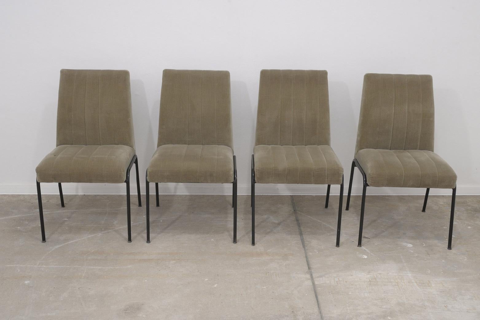 Set of four upholstered chairs from the 1960s. Interestingly curved seat backs. The chairs reminds works of Piere Guariche. Upholstery in good Vintage condition. Metal construction. Chairs bears some signs of use and age.

Price is for the set of