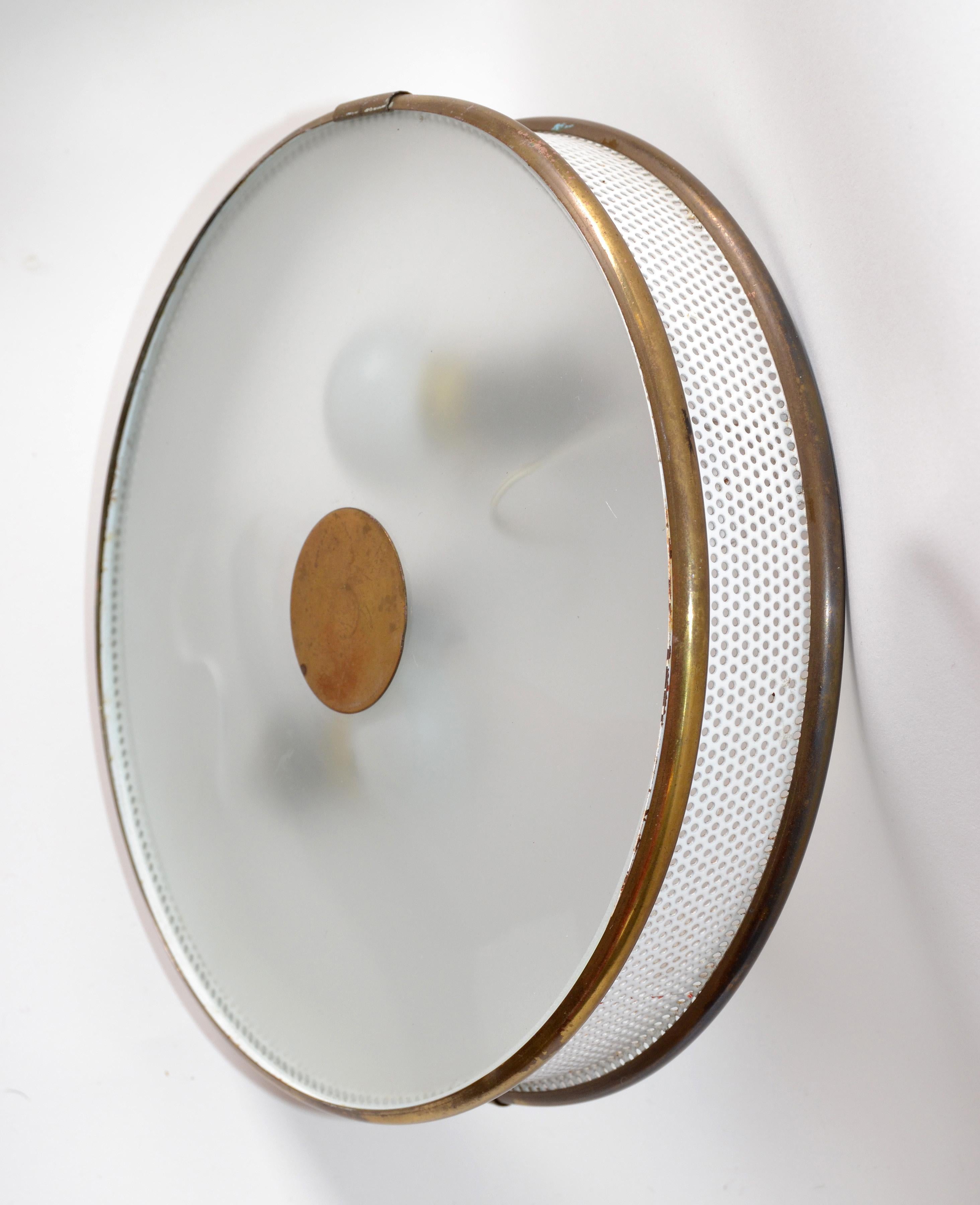 Small model of Guariche for Arlus flush mount, ceiling light in white wire mesh and brass framing.
The Top is round frosted glass wit a flat Brass knob.
All original European wiring and sockets, takes 2 light bulbs with max. 40 watts.
In working