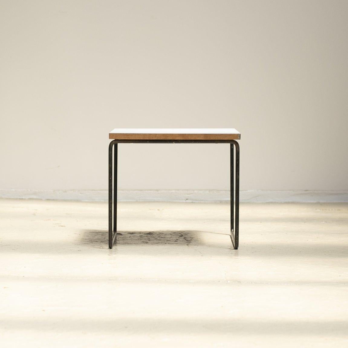 1950s / France
Size W395 D395 H355 mm

The VolanteSide table designed by Pierre Guariche. Made of melanin-applied wooden top and black painted steel legs.
     