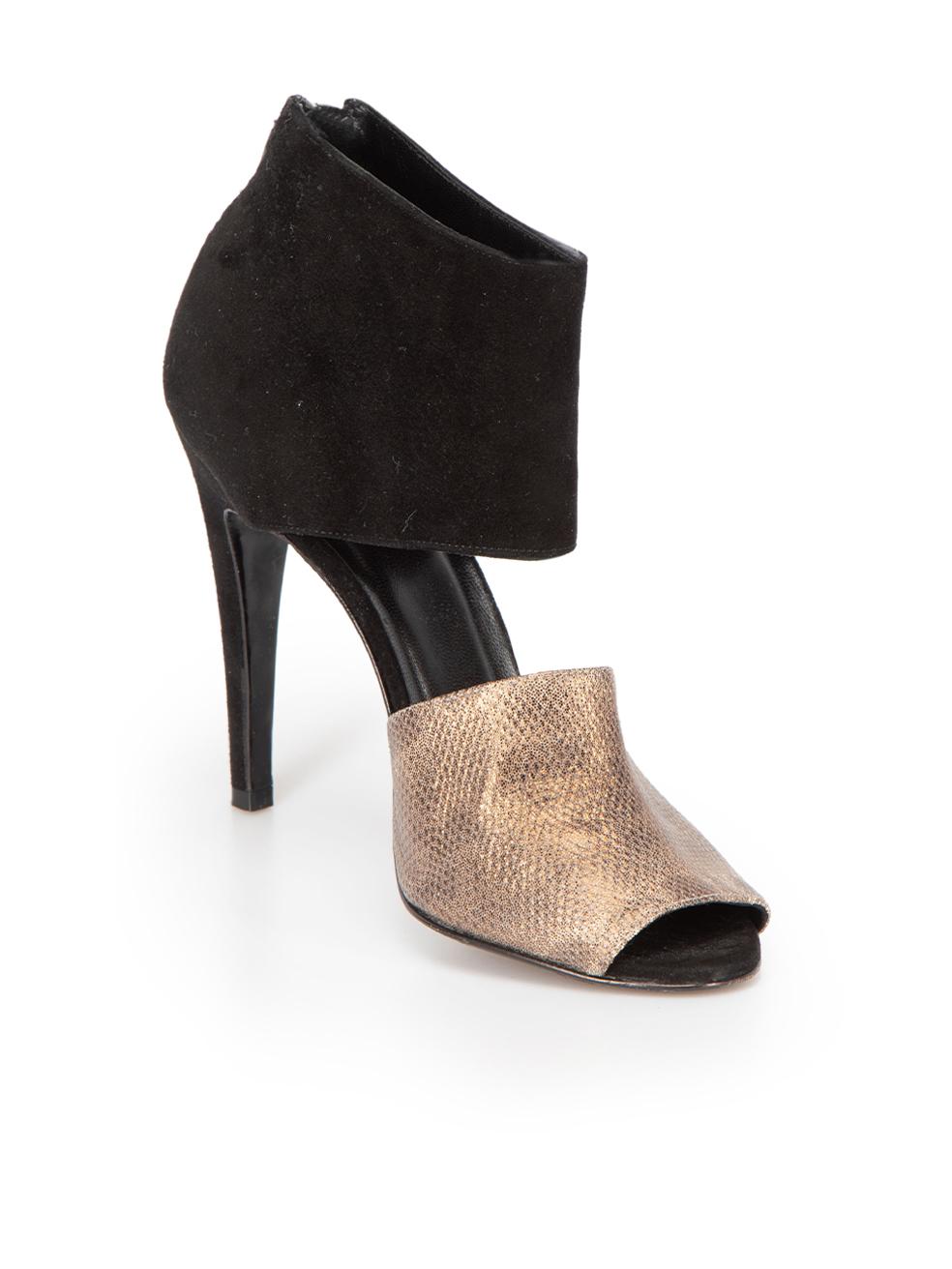 CONDITION is Good. General wear to shoes is evident. Moderate signs of wear to the rear of both shoes, particularly the right where the zip seam has started to come away. Scuffing can also be found at both heel stems on this used Pierre Hardy