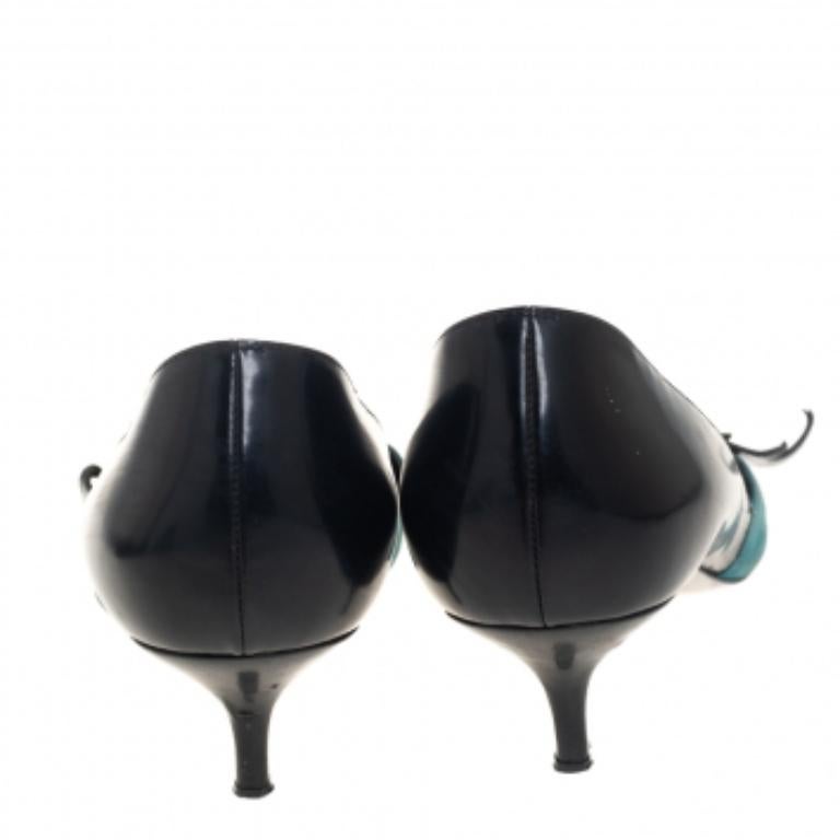 Every wardrobe deserves a quirky pair of pumps and what better than these splendid ones from Pierre Hardy! The multicolor pumps are crafted from leather and suede and styled with pointed toes and exaggerated eye motifs detailed on the vamps. They