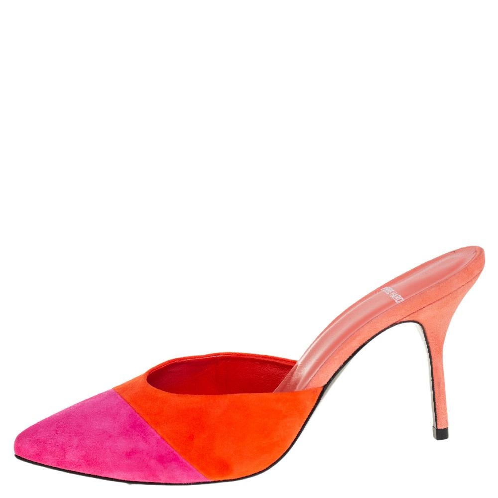 Timelessly elegant and stylish, Pierre Hardy's designs capture the effortless, nonchalant charm of the modern woman. Crafted from pink and orange suede, the mules carry sleek pointed toes and 9 cm stiletto heels.

