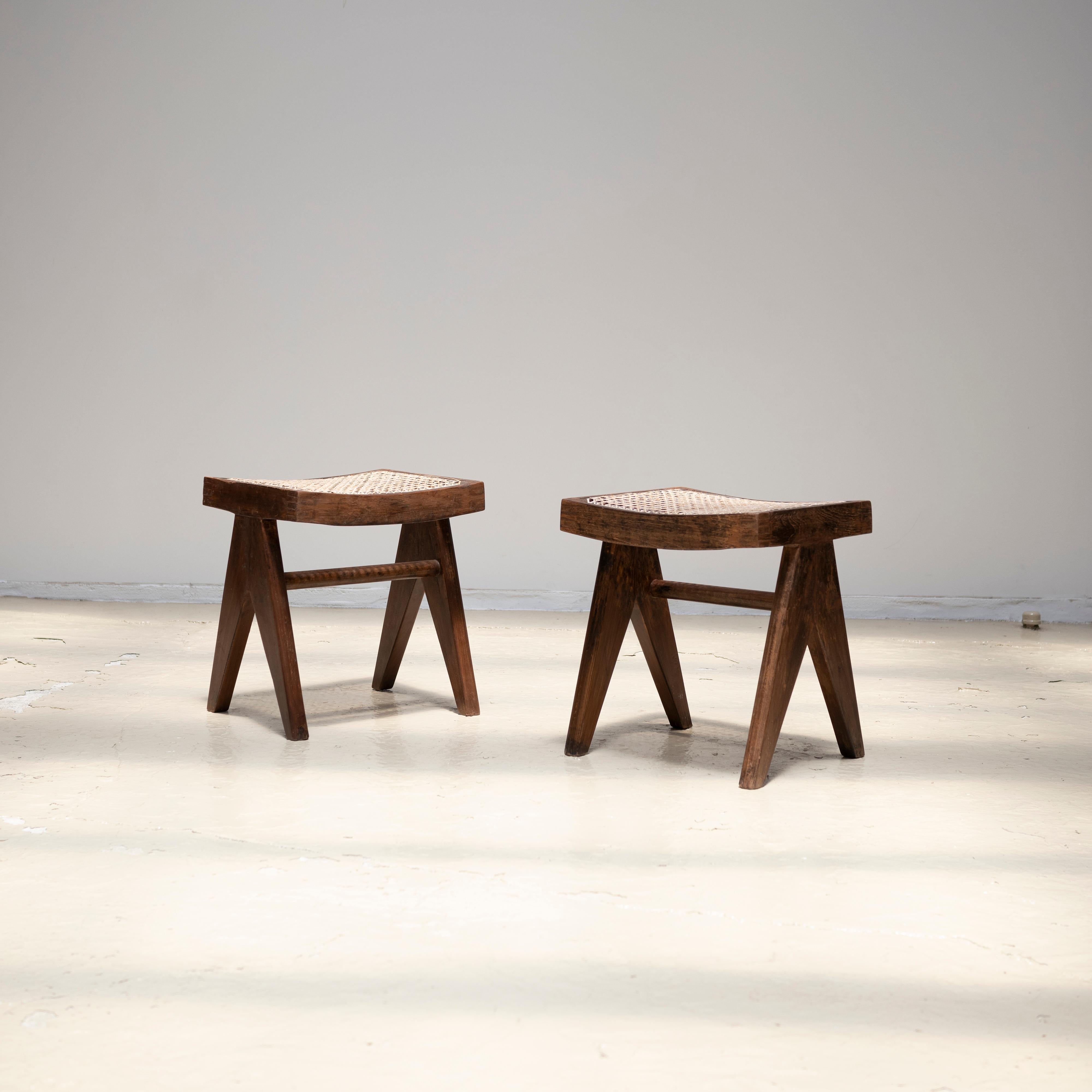 A-legs low stools in solid teak and braided canework designed by Pierre Jeanneret in 1955-56.

Provenance: Post-Graduate Institute, Chandigarh,
Quantity: 1.  ( 1 sold out)