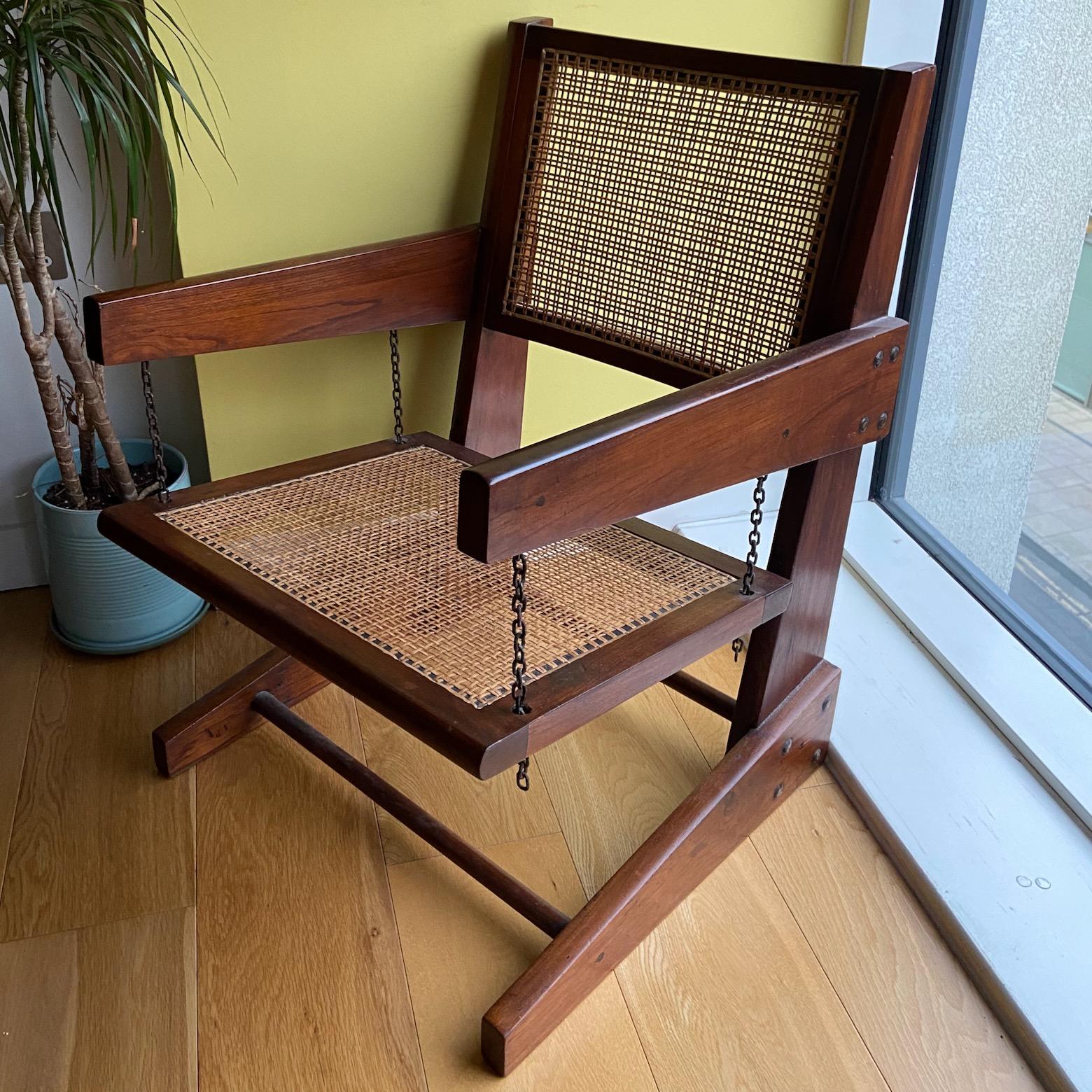 A superb rare modernist Pierre Jeanneret swinging lounge chair, circa 1955. From Chandigarh.
Lovely dark waxy patina, beautiful condition and lots of character.
Similar examples illustrated p 278, 323, 557 
« Le Corbusier, Pierre Jeanneret,