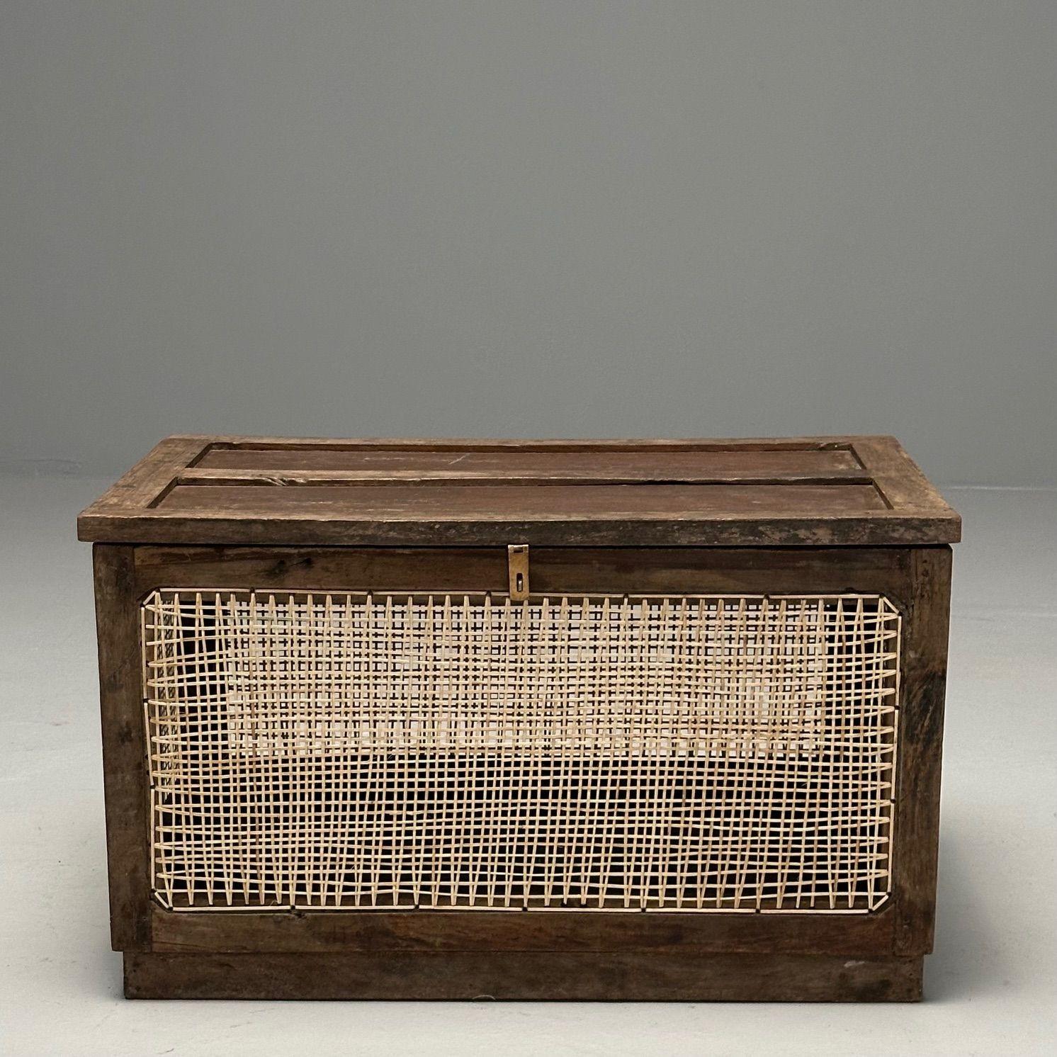 Pierre Jeanneret, French Mid-Century Modern, Dirty Linen Basket, Cane, Teak, Chandigarh, India c. 1960s

Rare 'Dirty Linen' box designed by Pierre Jeanneret for Chandigarh, India. This piece can also be used as a side table or coffee table in