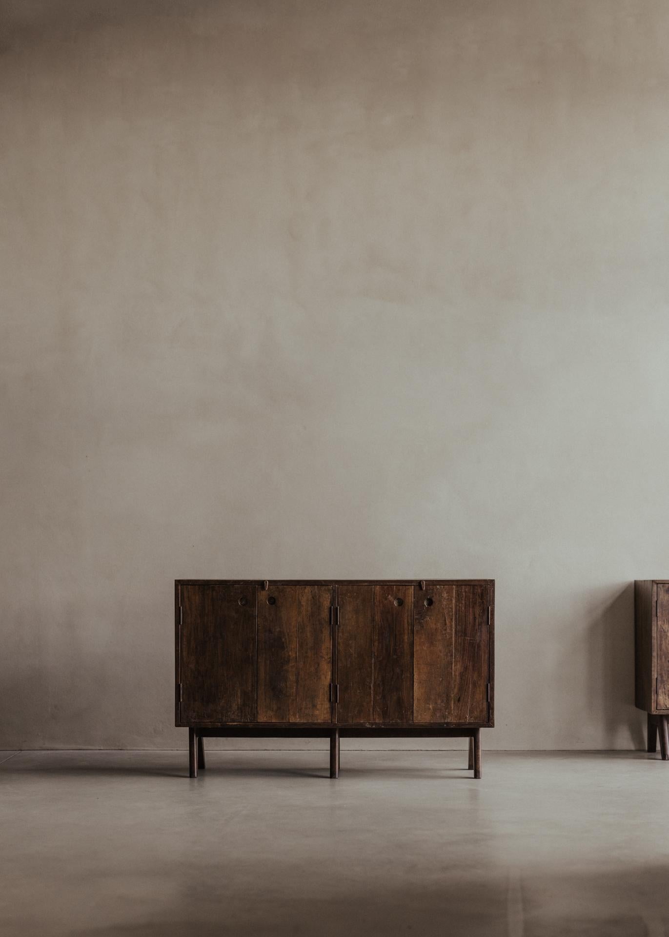 Authentic PJ-R-14-A Storage Unit or Low Cupboard, c. 1957–58 by Pierre Jeanneret. Designed for the Secretariat (1958) and various administrative buildings. It has four doors equipped with aluminum-backed grips and distinctive legs - three short,