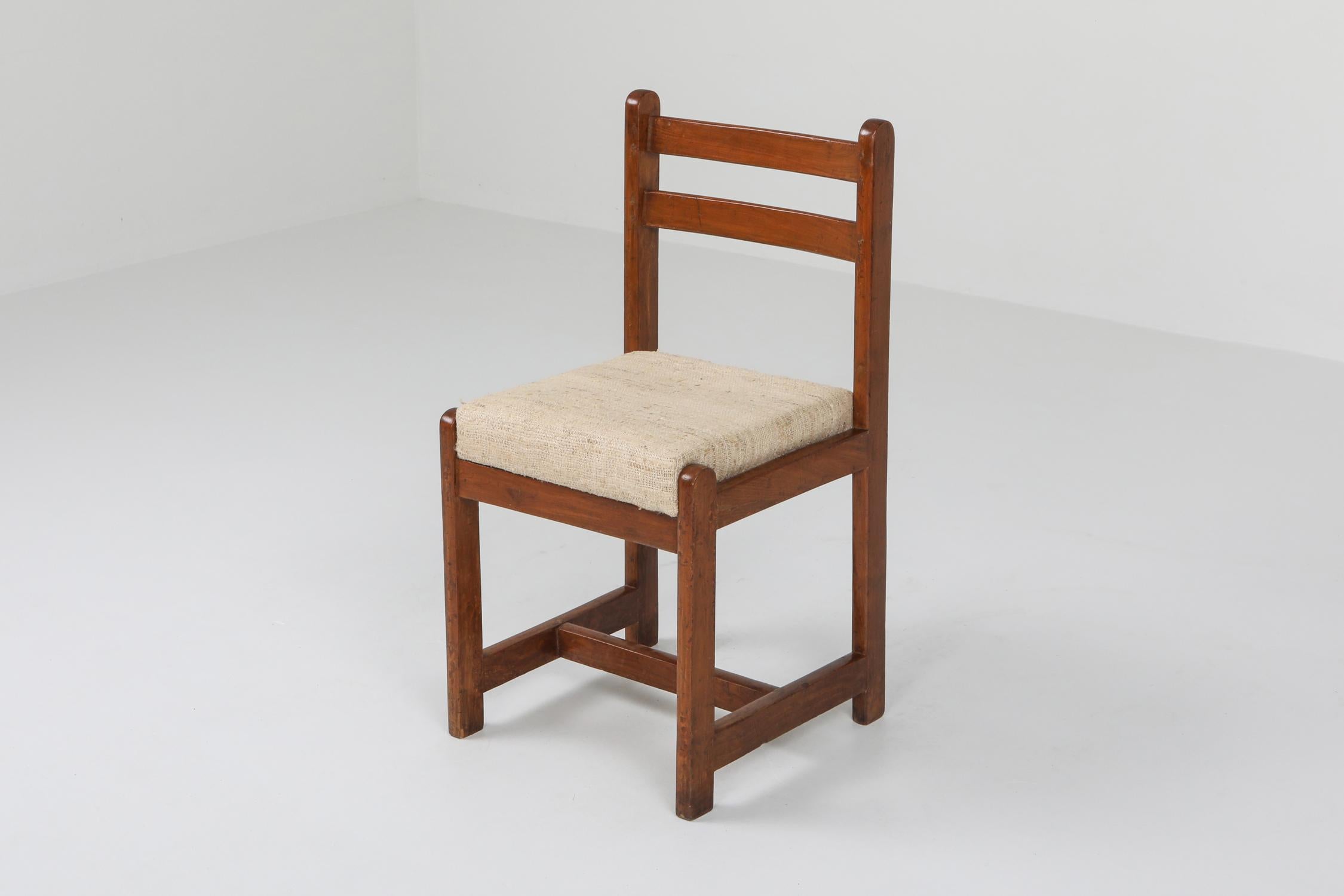 Chandigarh study model chair
prototype piece which was never incorporated in Chandigarh
woven linen seating
Designed by Corbusier cousin, Pierre Jeanneret. 
France/India, circa 1960. 

Literature: Le Corbusier Pierre Jeanneret: The Indian