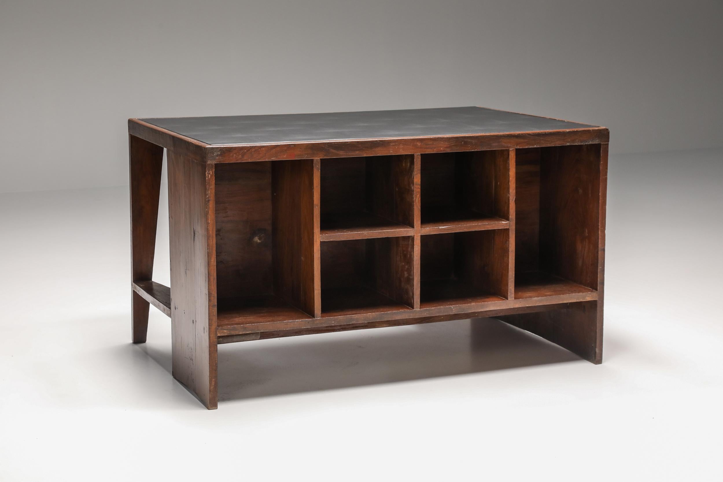 Pierre Jeanneret, Chandigarh Pigeonhole office desk, circa 1957-1958

This charismatic office desk was Intended for the secretariat and various administrative buildings in Chandigarh, India.
  