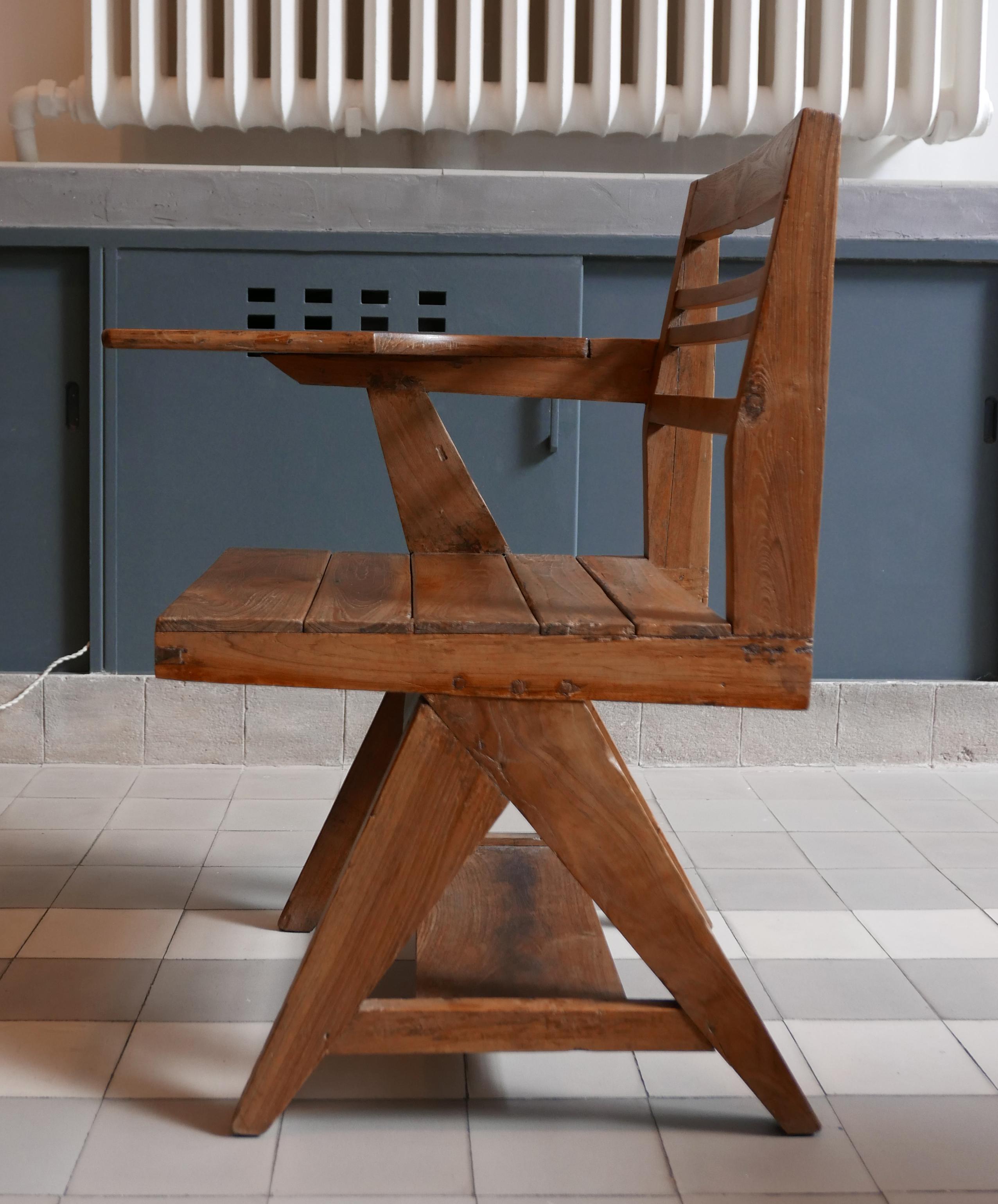 Pierre Jeanneret
PJ-SI-26-C
Writing chair, circa 1960
Version with seat and back with slats.
Solid teak.
Tablet under seat.
Chandigarh, India, Punjab University.
