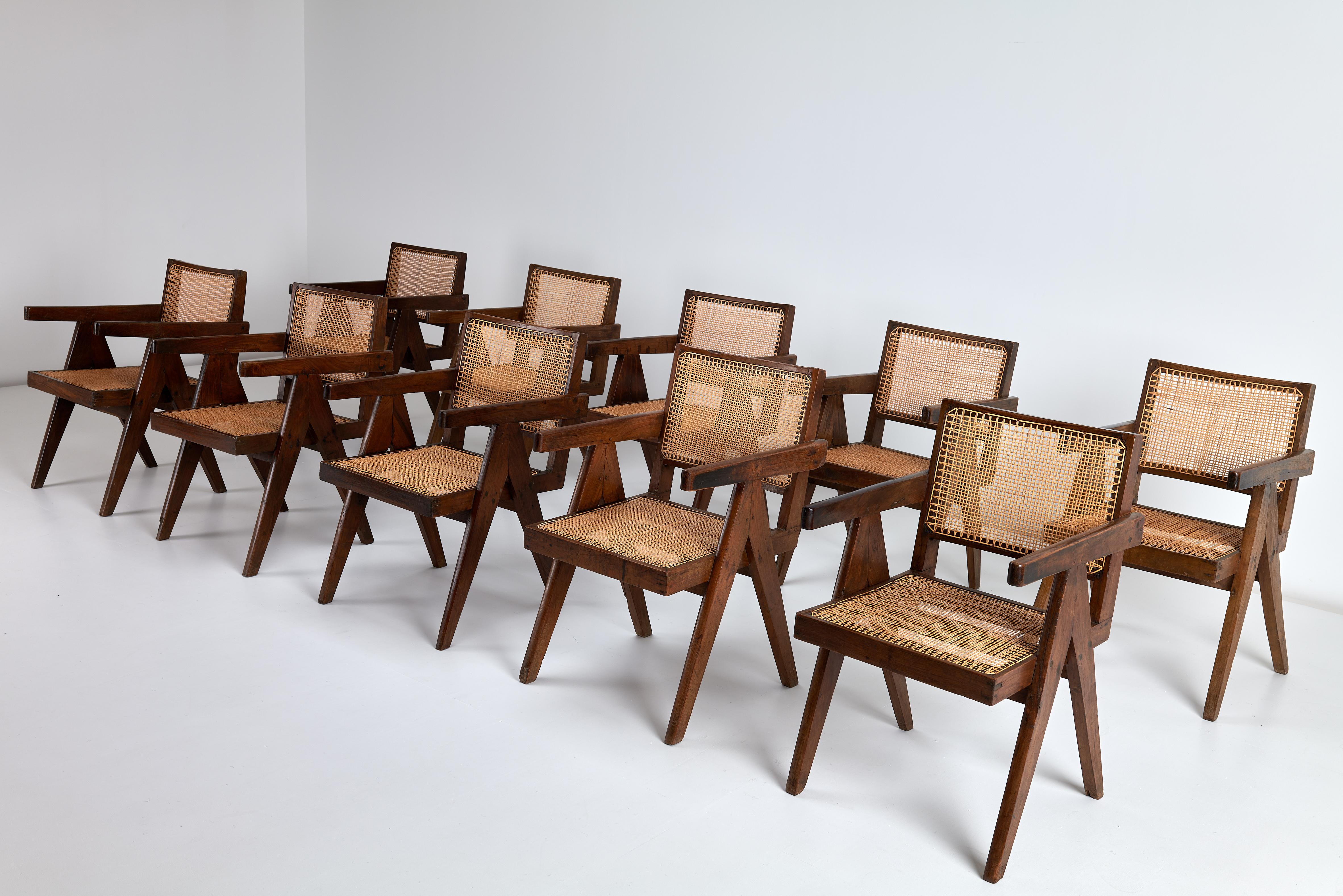 This exceptional set of ten Pierre Jeanneret Conference Armchairs, crafted in teak with their signature cane seat and back and ‘A’ frame, is a true masterpiece of mid-century modern design. Designed by Jeanneret for the brutalist city of Chandigarh,