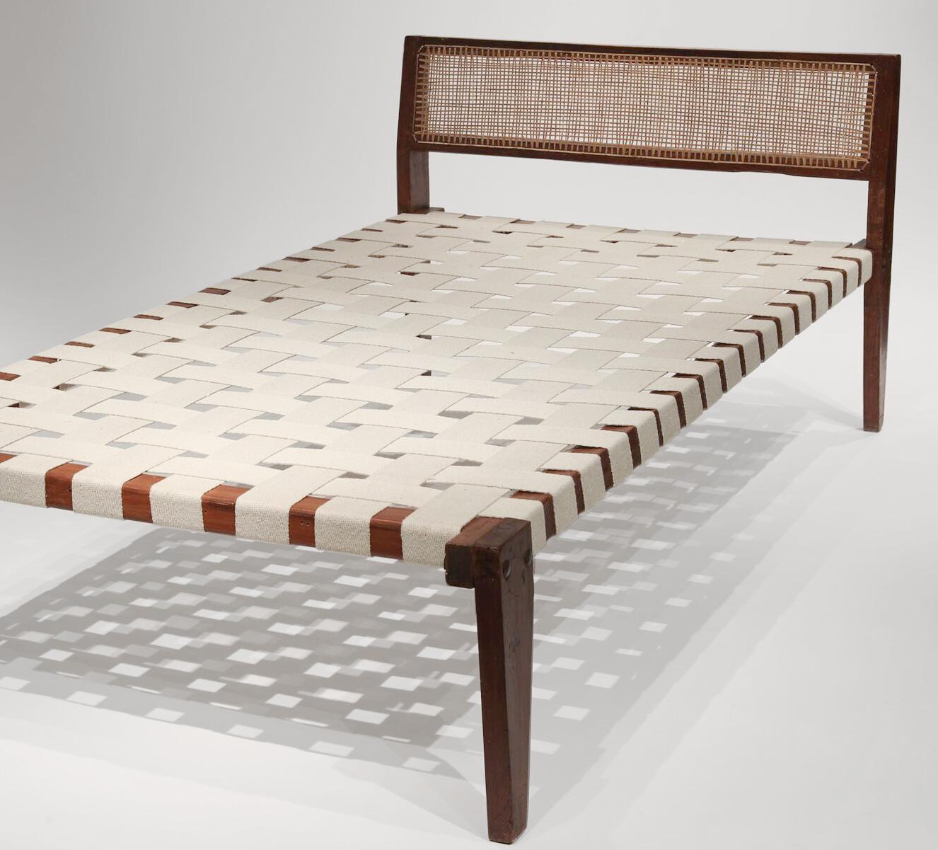 Pierre Jeanneret Daybed from administrative buildings Chandigarh, India. Teak frame, cane and woven strapping. Original finish, cushion has been recovered in button tufted grey fabric with cream piping. Good to very good overall condition, circa