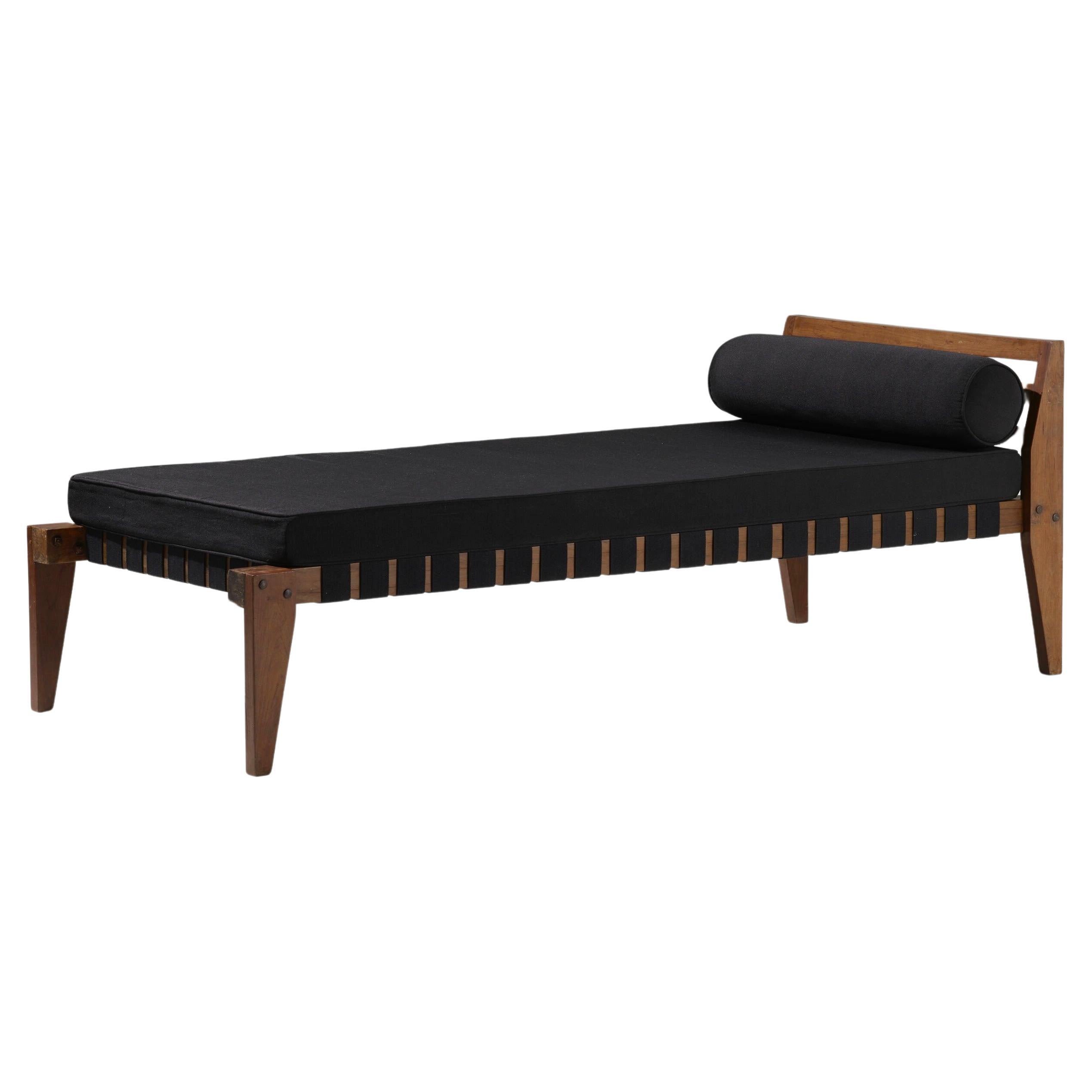 Beautiful Pierre Jeanneret daybed an the most elegant combination of black on teak wood. The simplicity of the design, yet robust and functional has inspired many versions all over the world, but these original pieces still maintain their unmatched