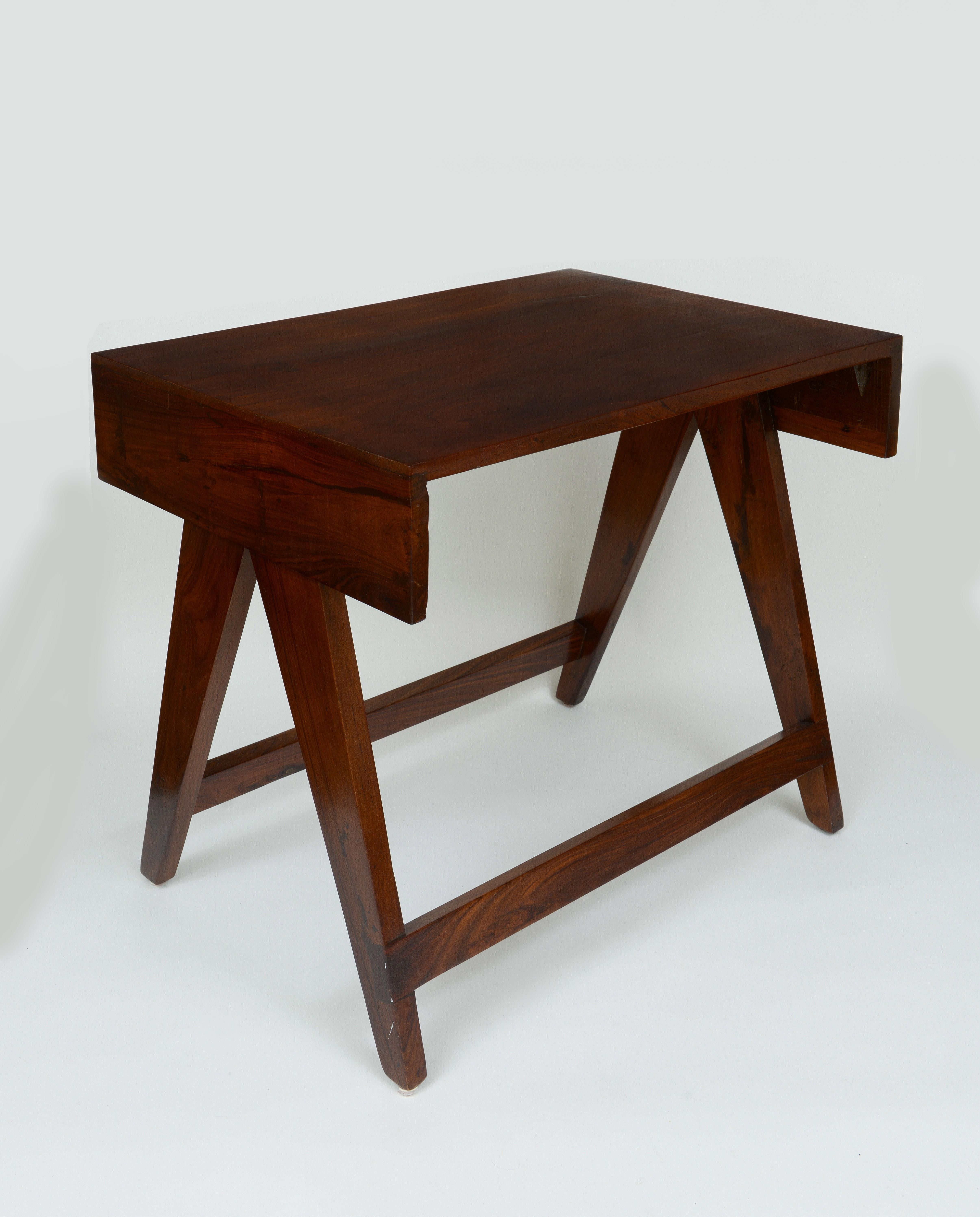 Pierre Jeanneret Desk and Stool from the city of Chandigarh, India 1950 - 1959 Teak Holland and Sherry boiled wool.

Desk: 27 H x 31.5 W x 23 D inches 
Stool: 16 H x 16 W x 13 D inches