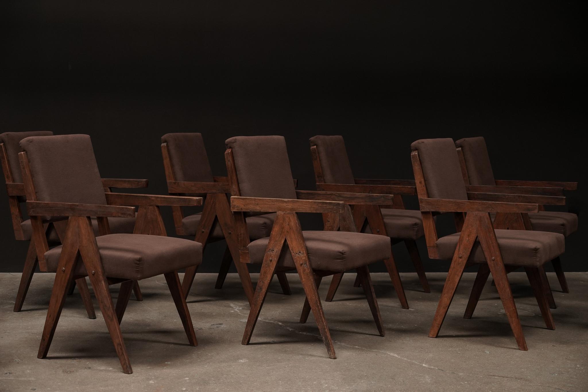 This set of ten Pierre Jeanneret Dining Arm Chairs showcases the designer’s iconic V-leg silhouette, paired with rich brown cotton upholstery for a warm, grounded look. A rare and cohesive collection, offering both architectural presence and