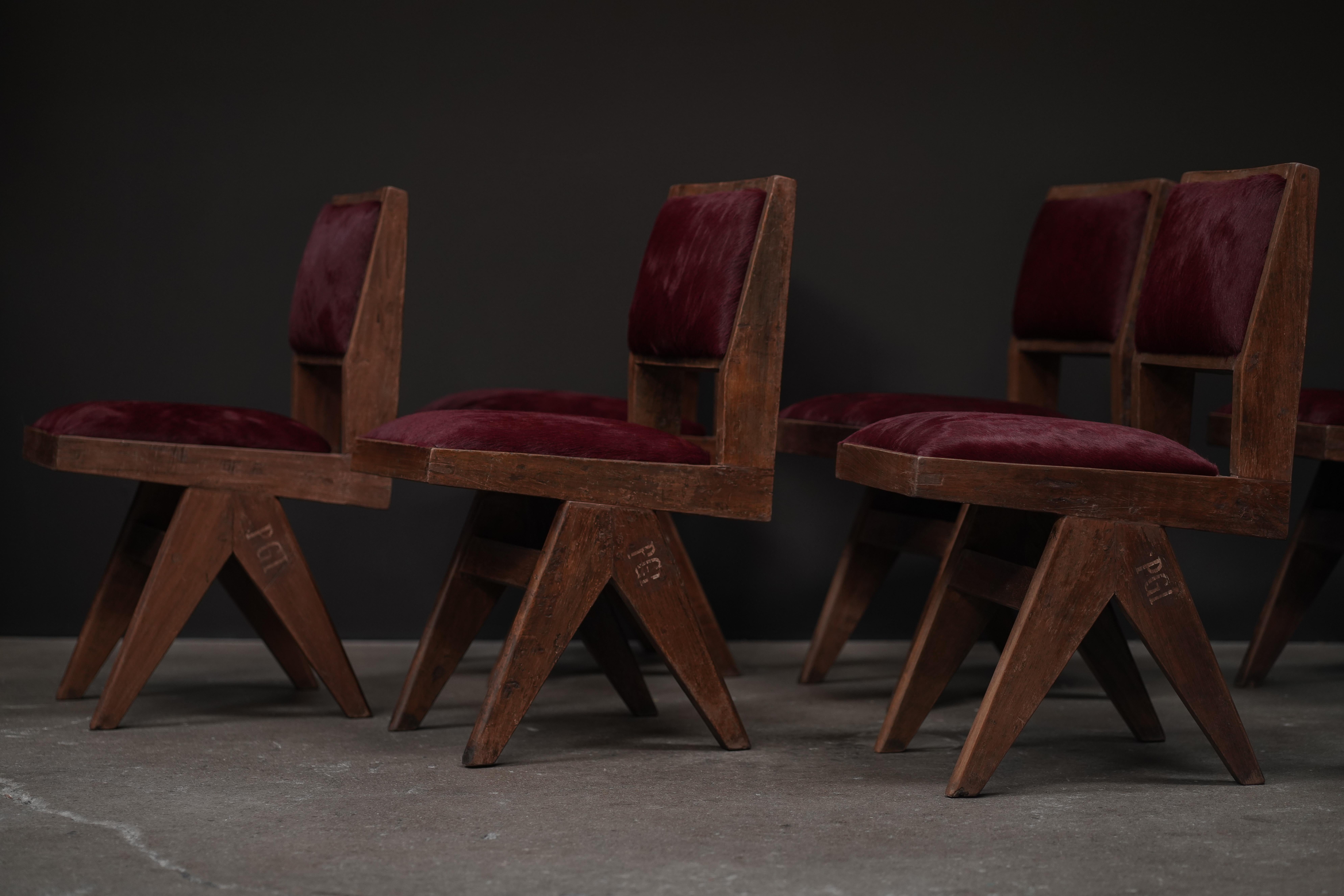 Pierre Jeanneret Dining Chair in Burgundy Hide In Good Condition For Sale In Los Angeles, CA