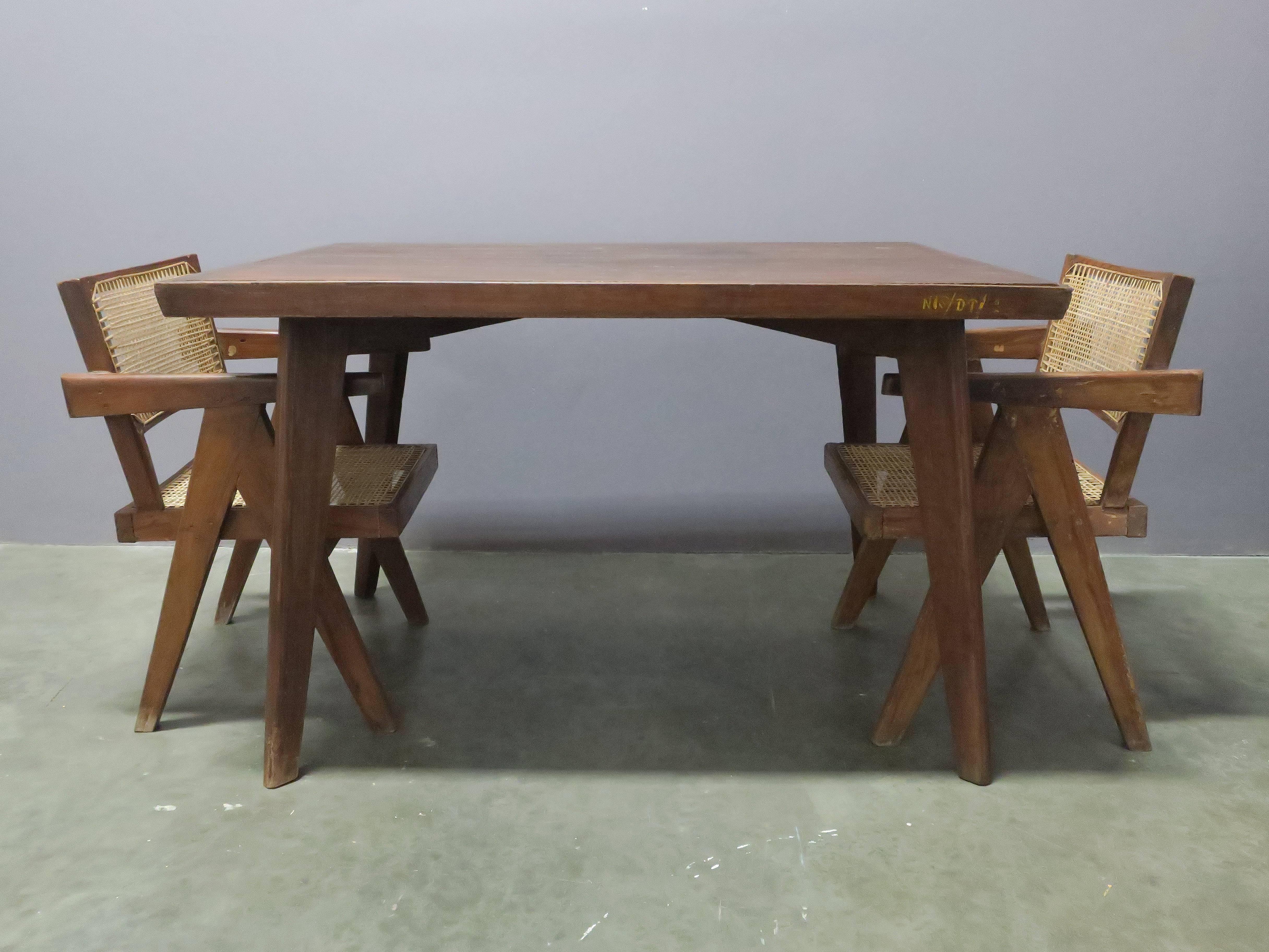 Original teak dining table from Chandigarh, India by Pierre Jeanneret. Solid teak construction.
