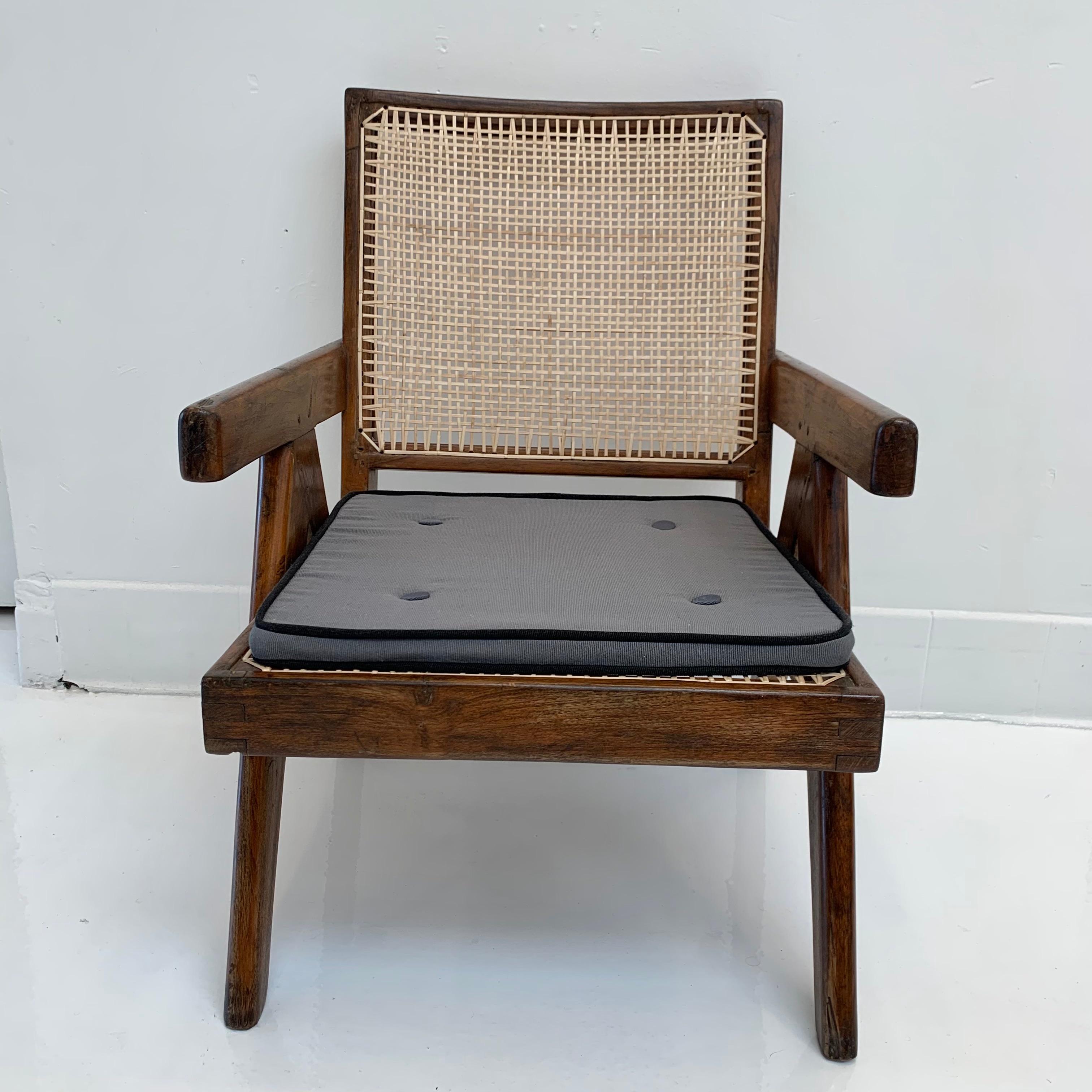 Fantastic collection of Pierre Jeanneret 'Easy' chairs / lounge chairs. Model PJ-SI-29-A. 10 available. Priced individually. All in very good condition. Teak, cane and upholstered cushion. Well documented chairs and piece of collectible design.