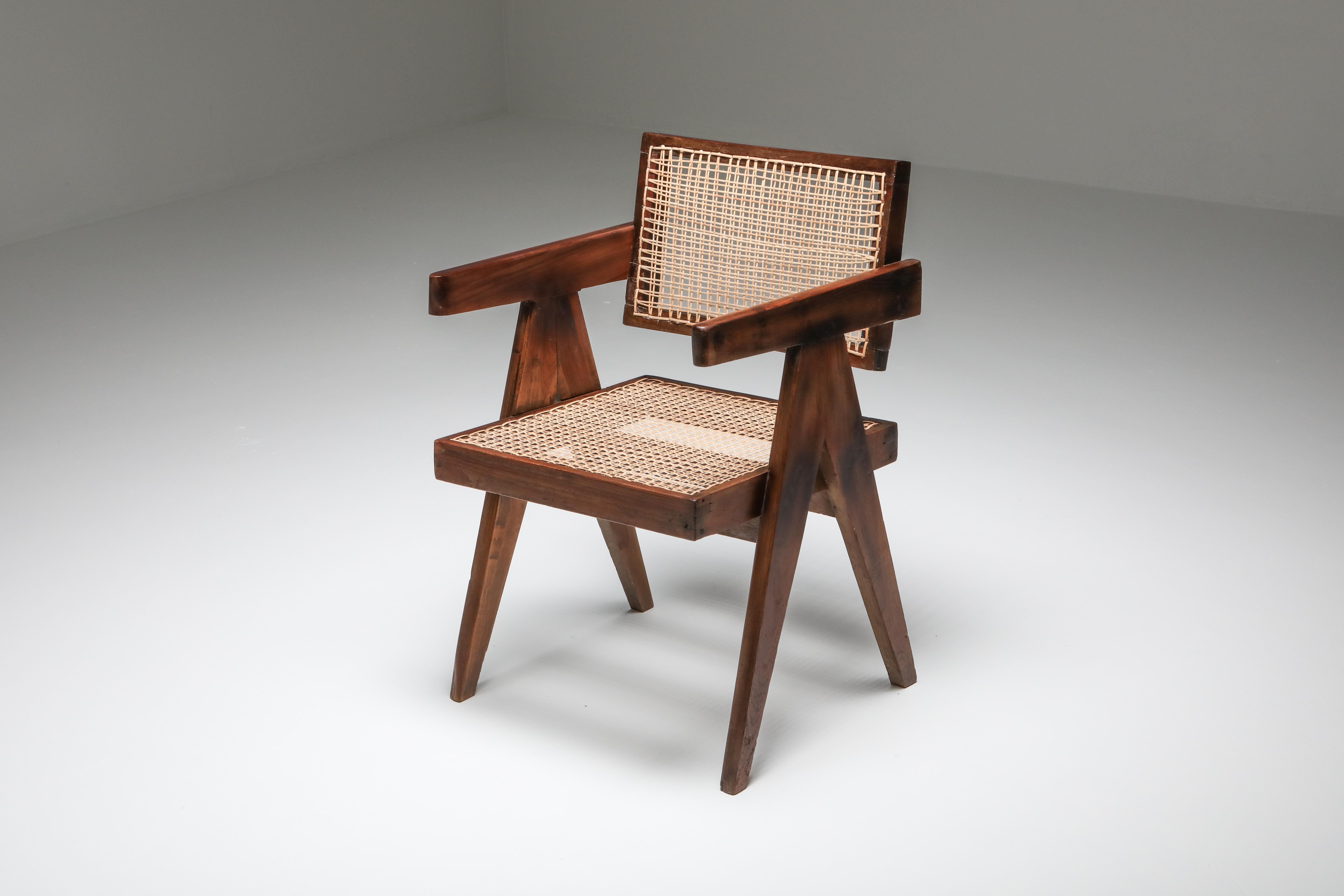 Floating back armchair, circa 1955, Pierre Jeanneret
Original teak and wicker armchair with cushions
Office chair from the administrative buildings of Chandigarh, professionally restored.
           