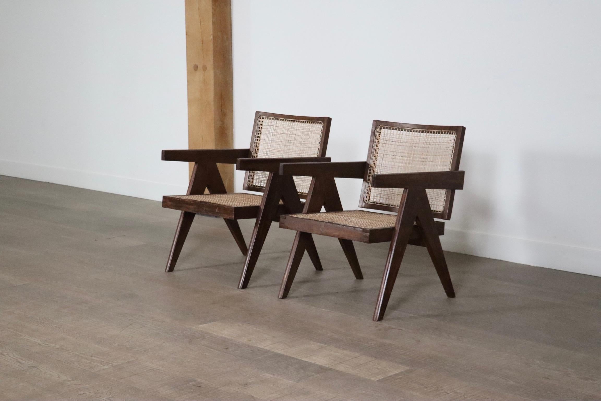 Extremely Rare Pierre Jeanneret “Fauteuil en Teck”, floating back lounge chairs, created in the 1950s for the city of Chandigarh in India, the utopian city designed by his cousin Le Corbusier.
These incredible chairs are made of solid teak with seat