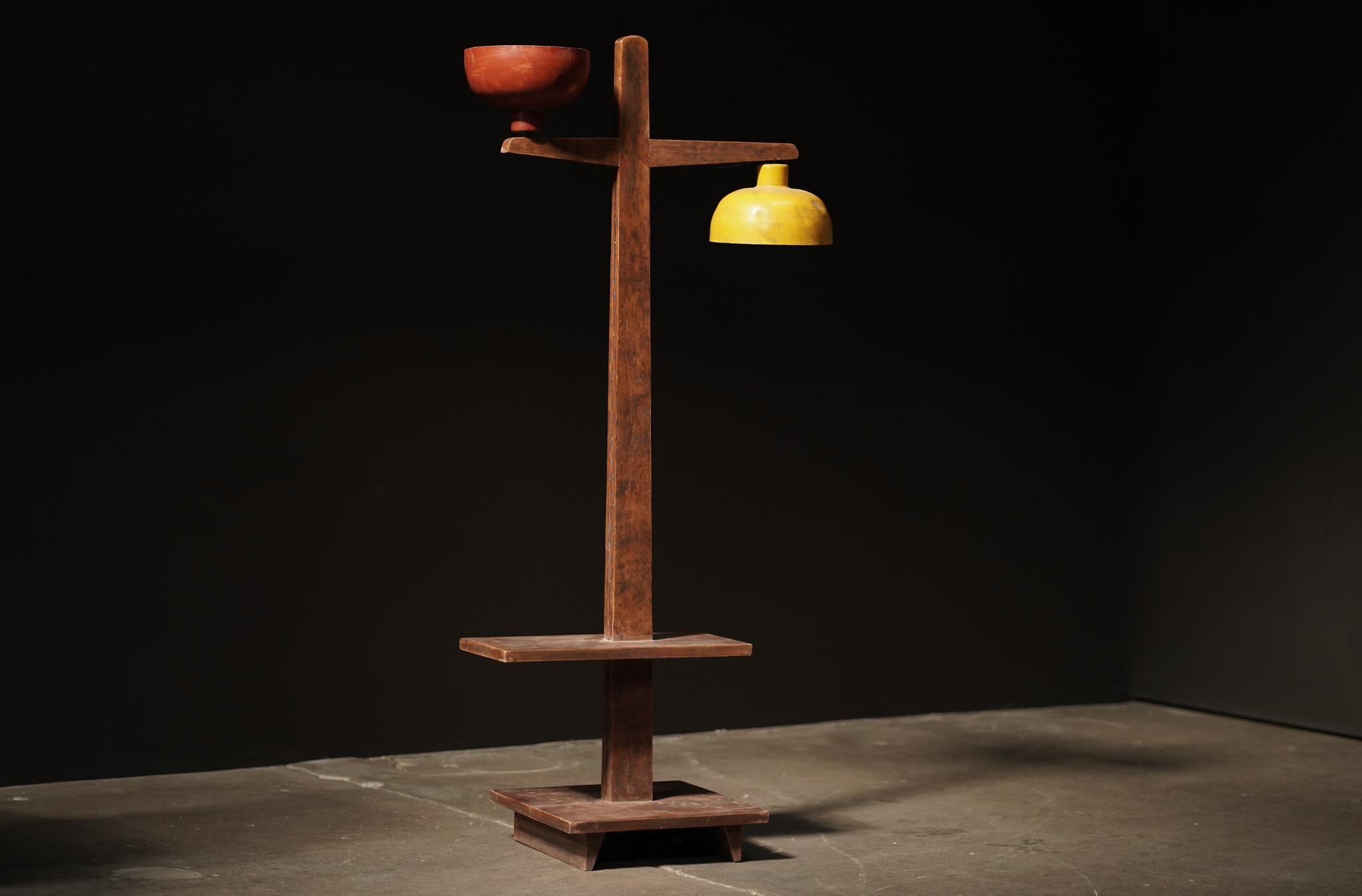 Circa 1950s, Pierre Jeanneret’s floor lamp combines subtle elegance with practical function. Its sculptural form and refined materials bring both light and quiet sophistication to a space. Crafted from teak and aluminum, it is a perfect example of